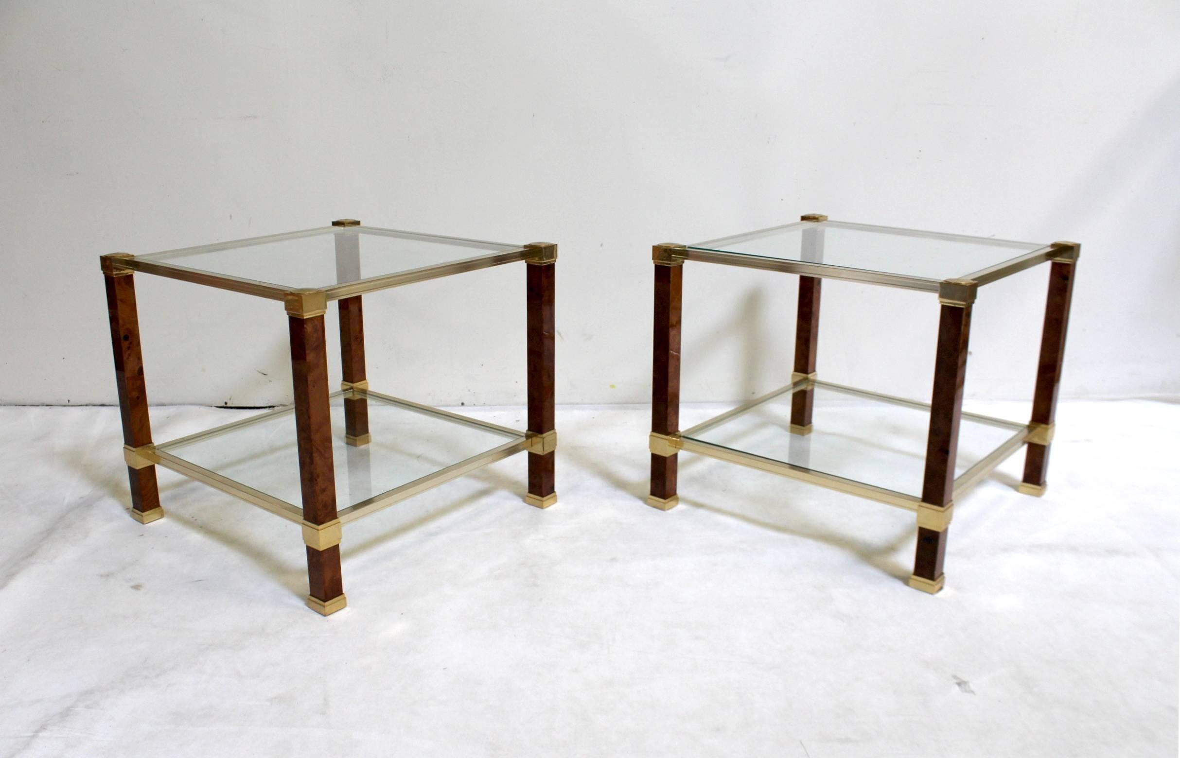 Pair of two-tiered side tables with speckled maple veneer and gilded metal by Pierre Vandel, Paris, circa 1970s.

Glass is in perfect condition, table shows small signs of wear.

 