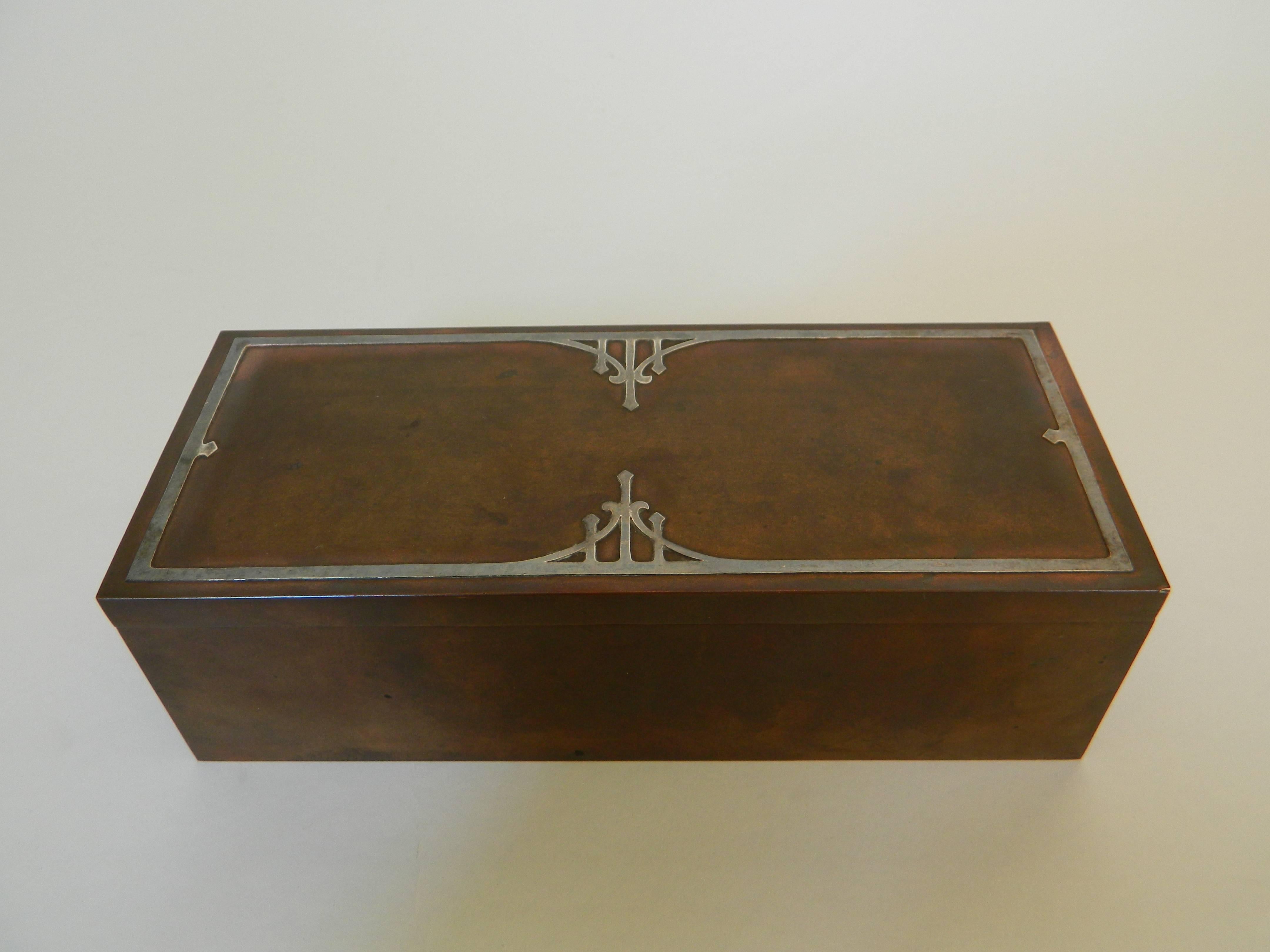Heintz Art Metal Shop, or AMHS engraving rests on bottom, along with August 27, 1912 date, which signifies the definitive patent for applying sterling silver to bronze without solder. A fine example of American Arts & Crafts movement. the box is in