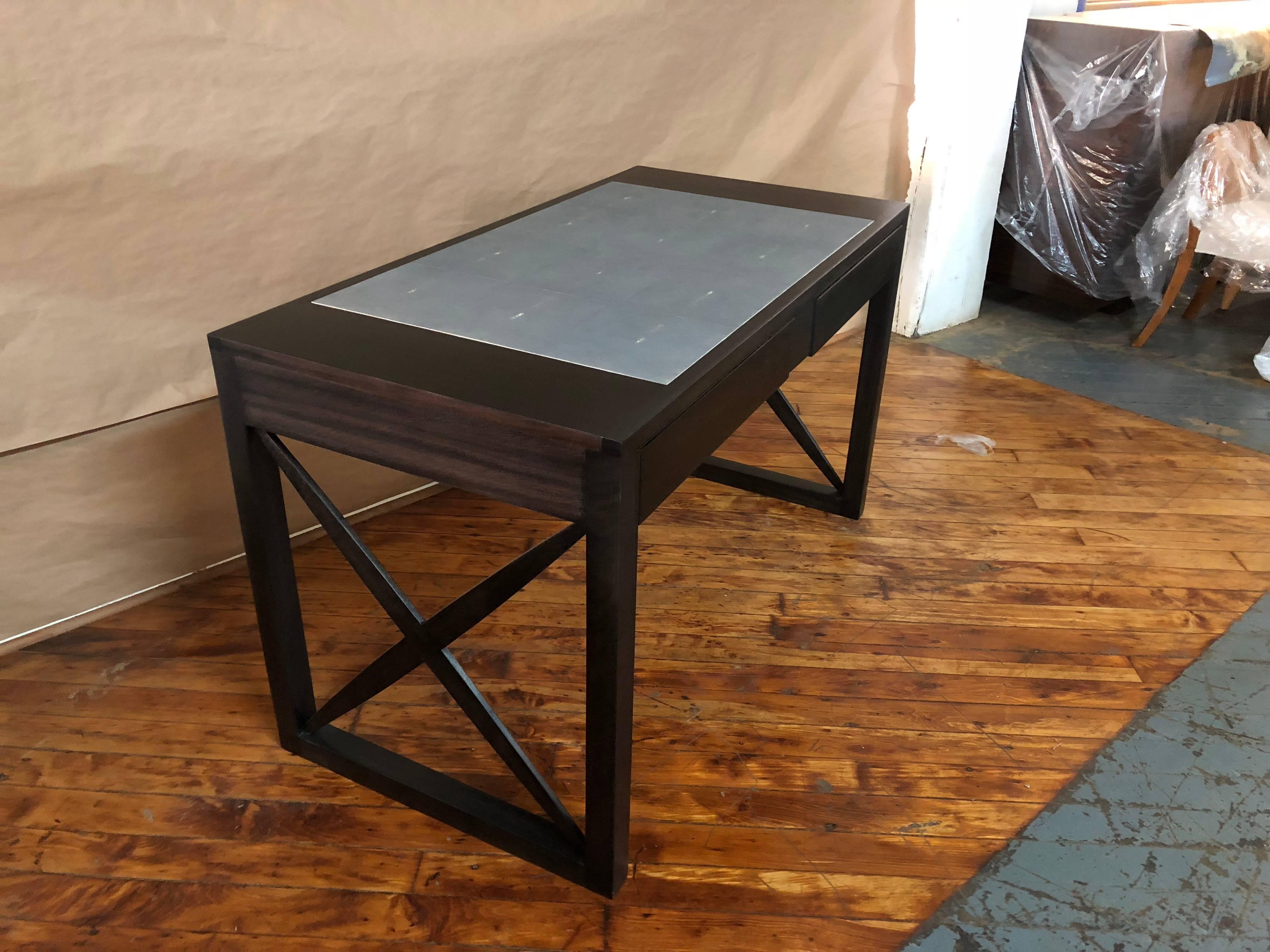 Shagreen top and mahogany ebonized desk

Customization is available upon request, customers can choose from a variety of:
Size
Wood
Finishes
Colors
Leather.