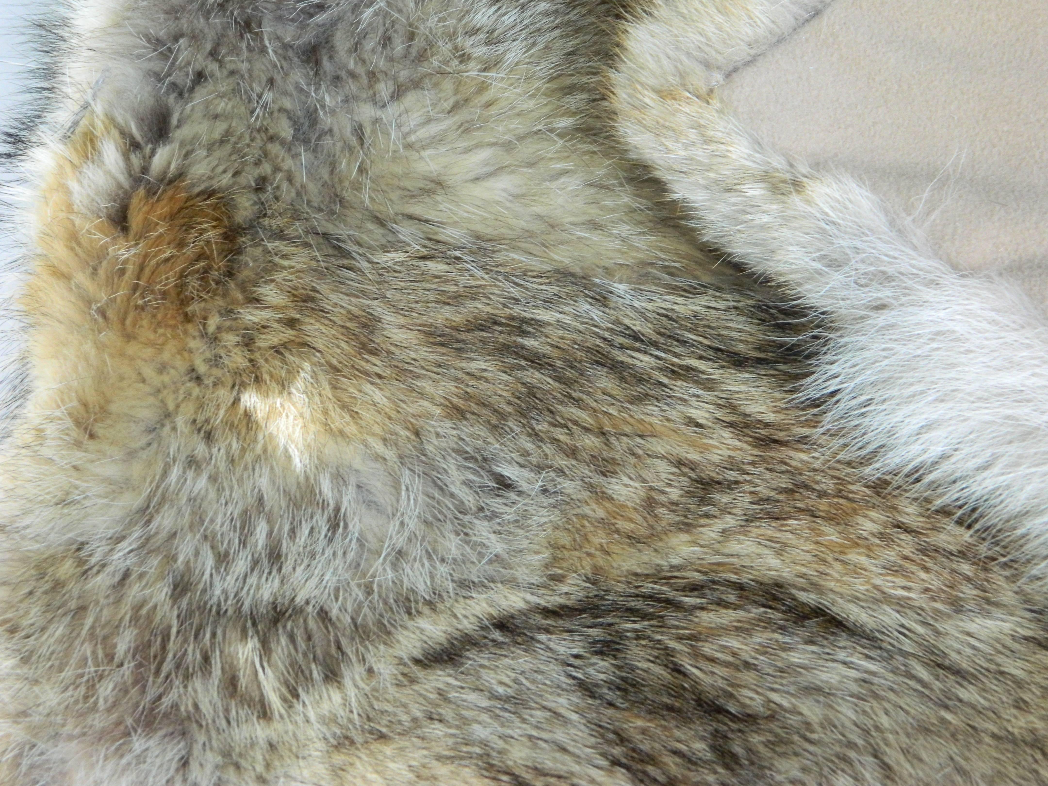 Beautiful large coyote fur throw.
We also custom make pillows, rugs and more in all colors and sizes.
 