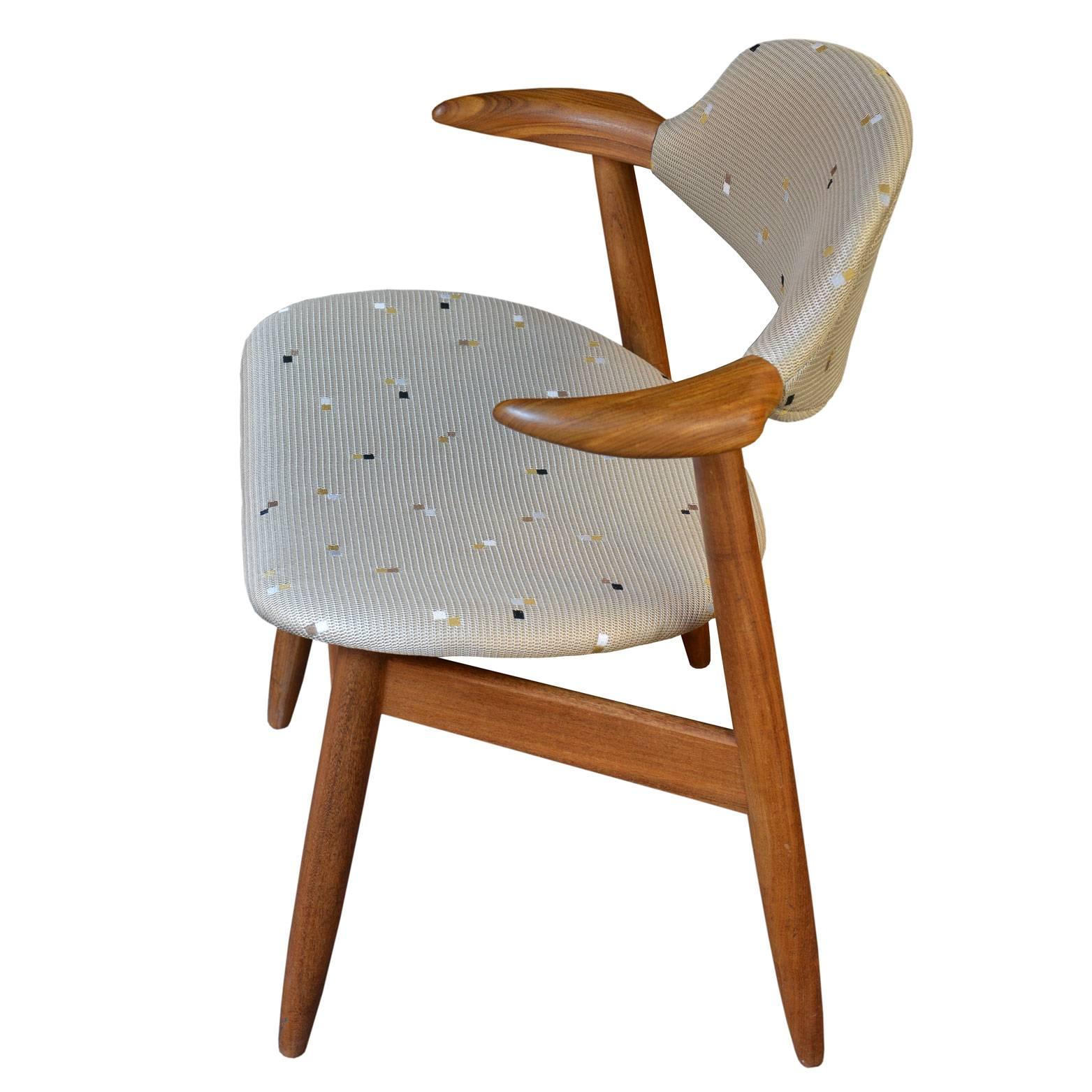 Desk chair in teak, realized in Denmark in the 1960s. The chair has been upholstered with the beige 