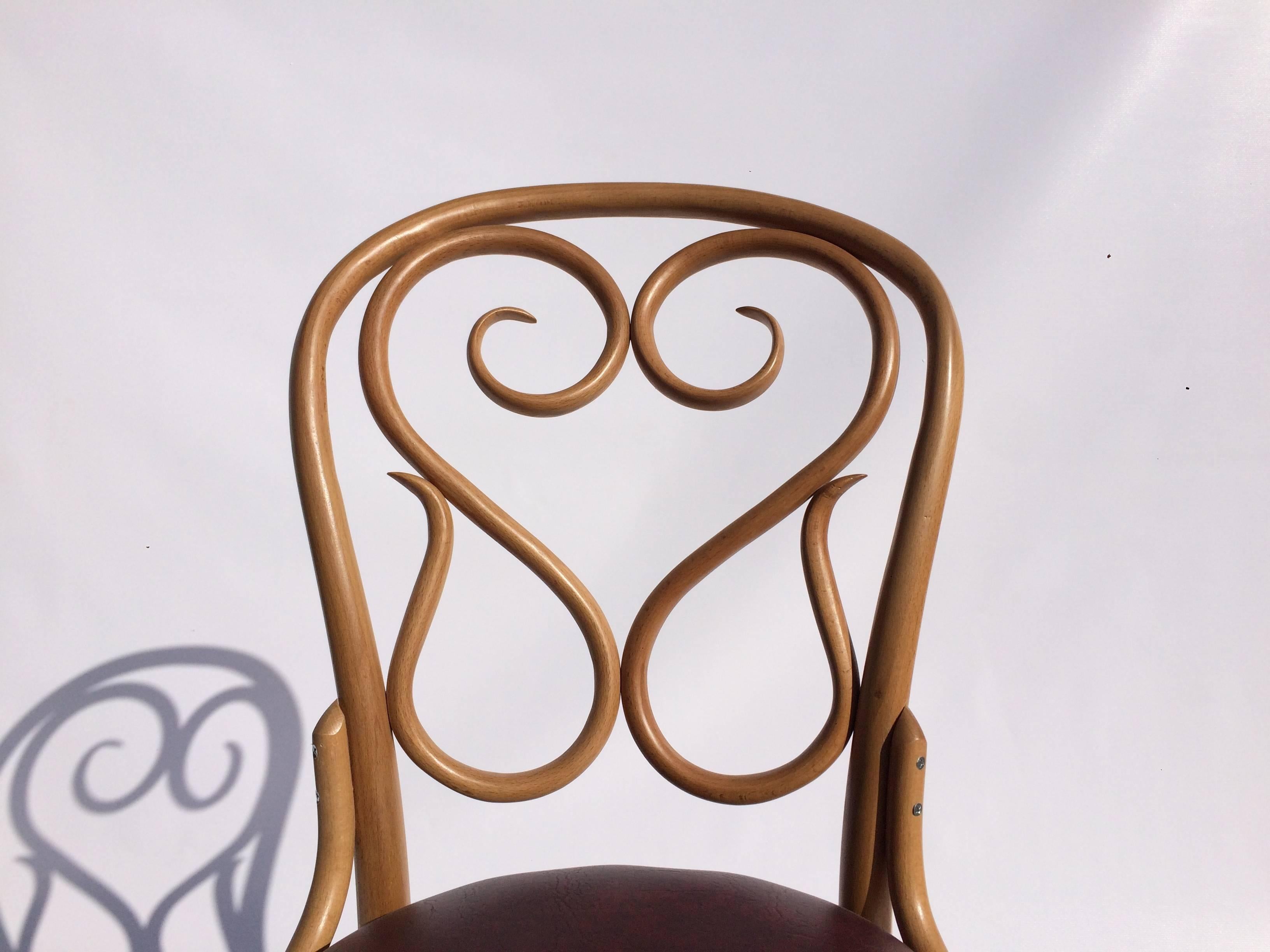Beautiful chairs, seats can be easily recovered to fit your decor. Set of four.