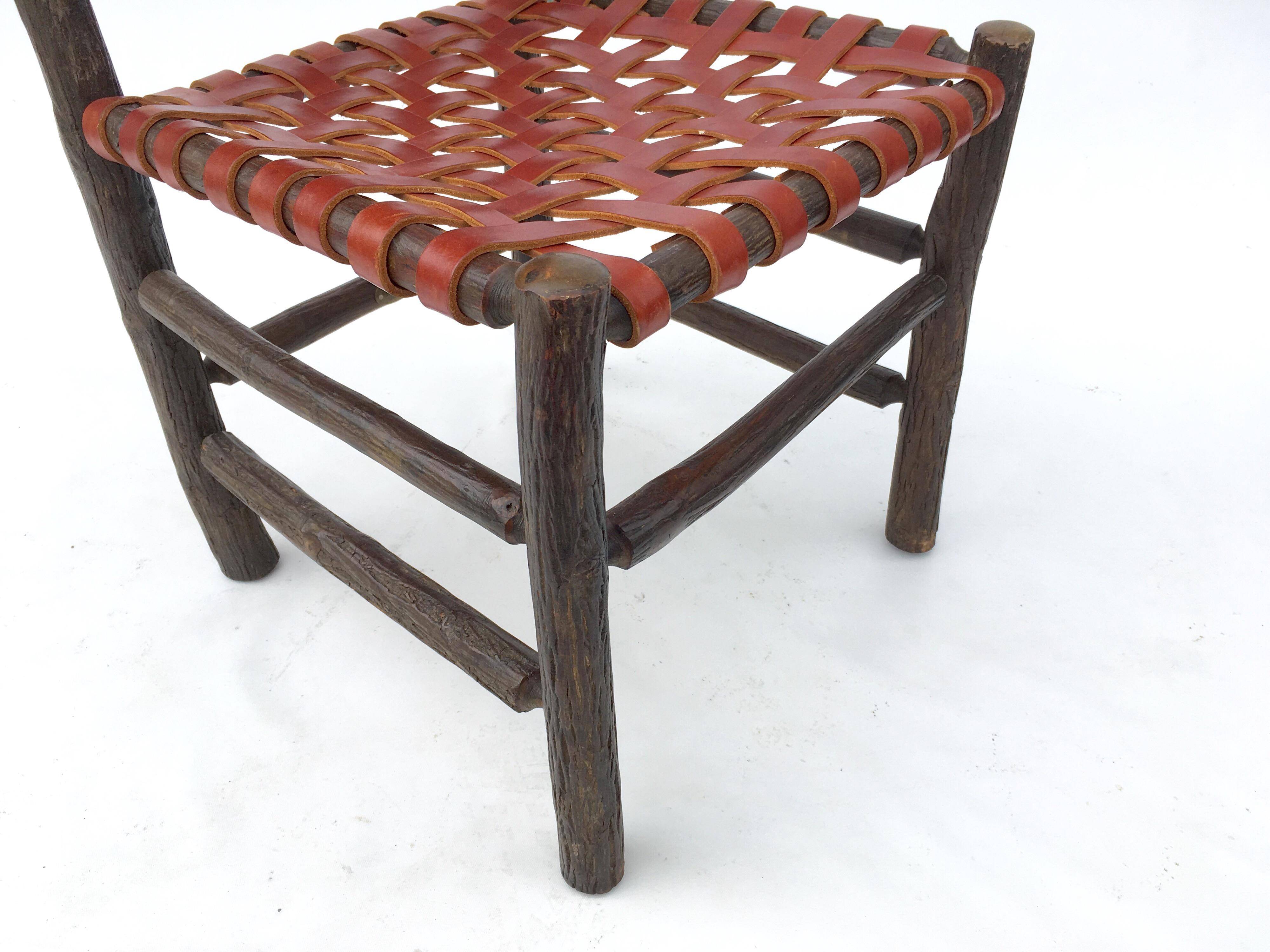 American Ten Old Hickory Dining Chairs with Woven Cognac Saddle Leather