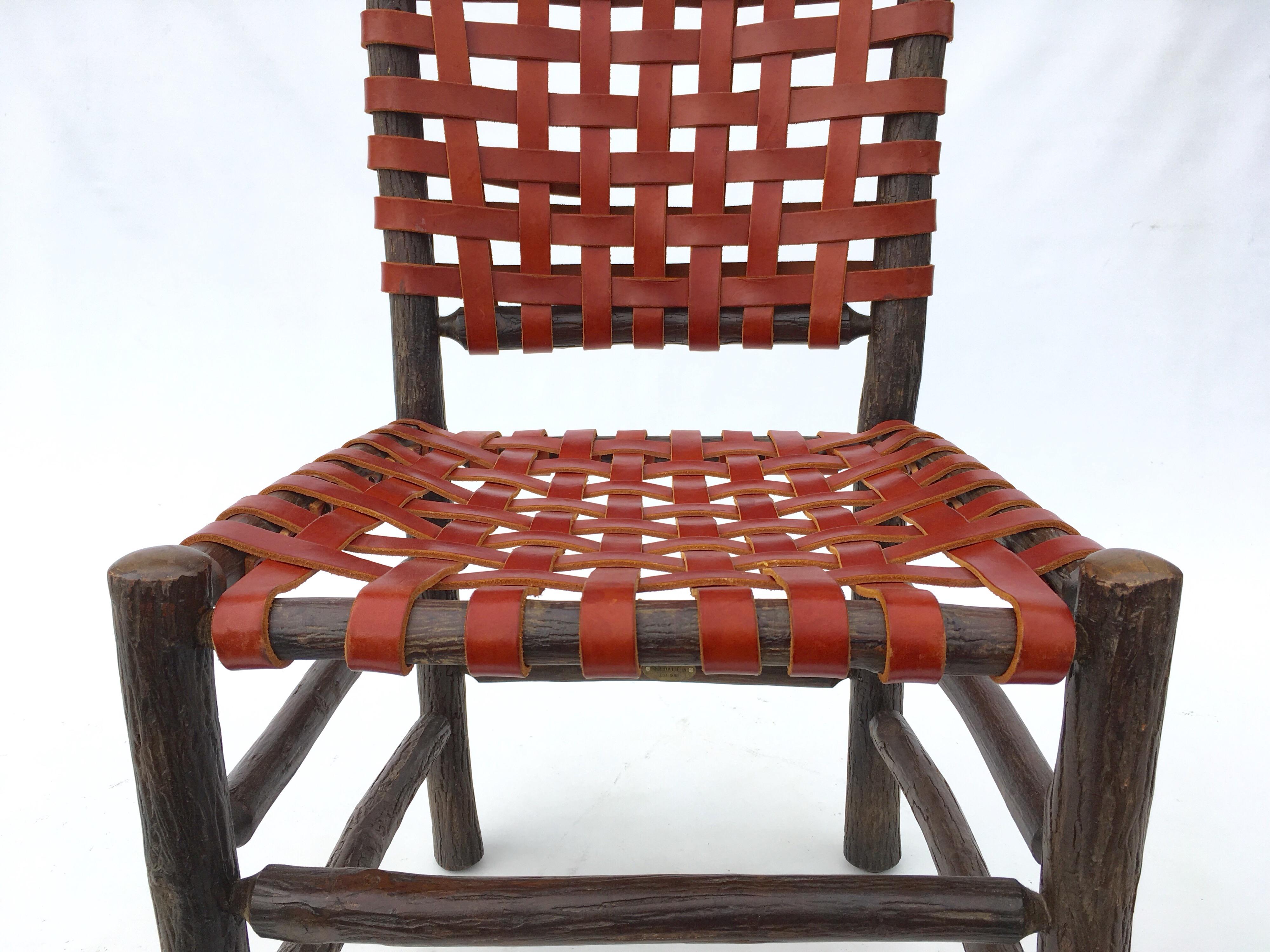 Ten Old Hickory Dining Chairs with Woven Cognac Saddle Leather In Good Condition In Miami, FL
