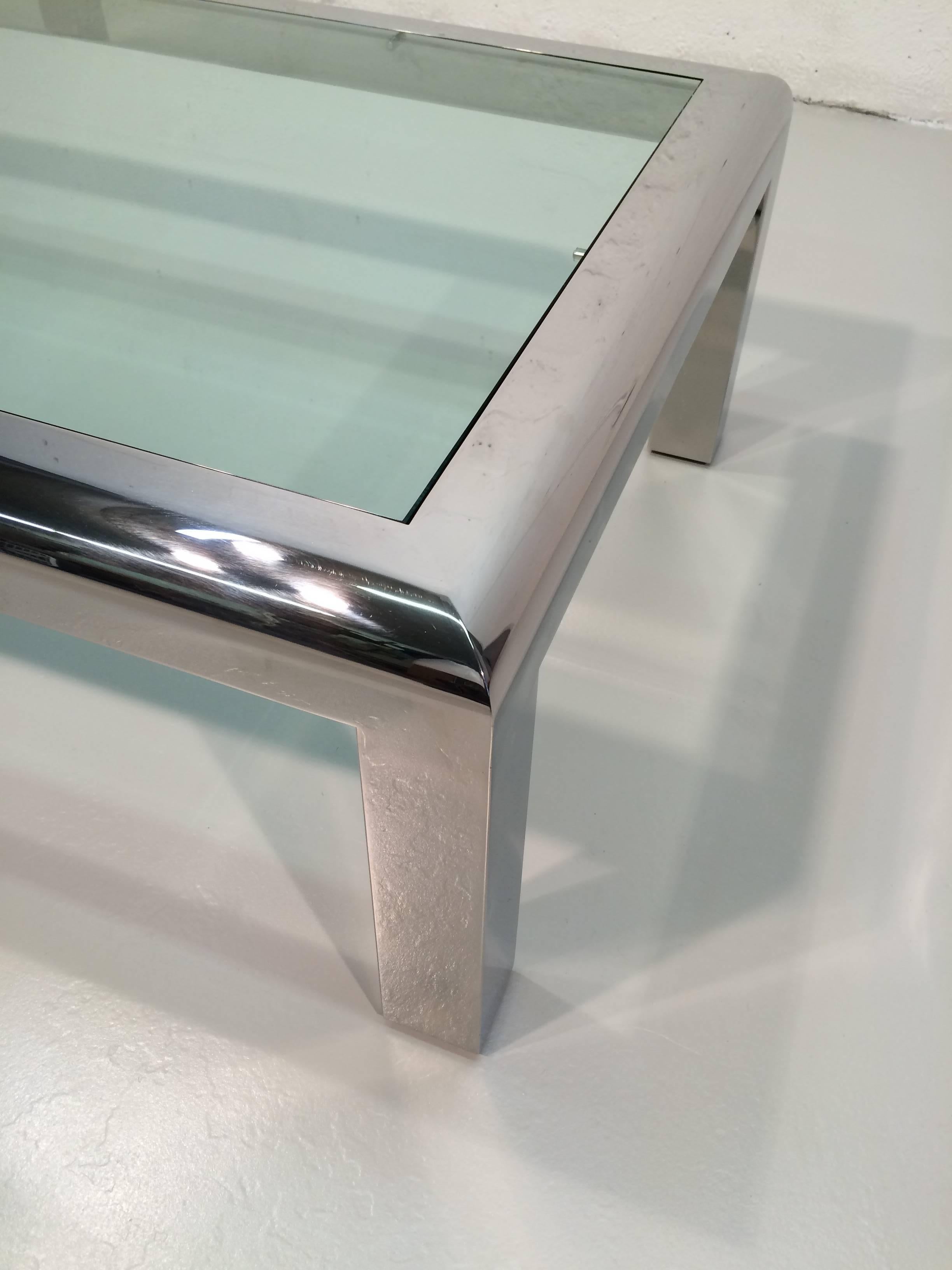 Very well-made stainless steel and glass coffee table.
