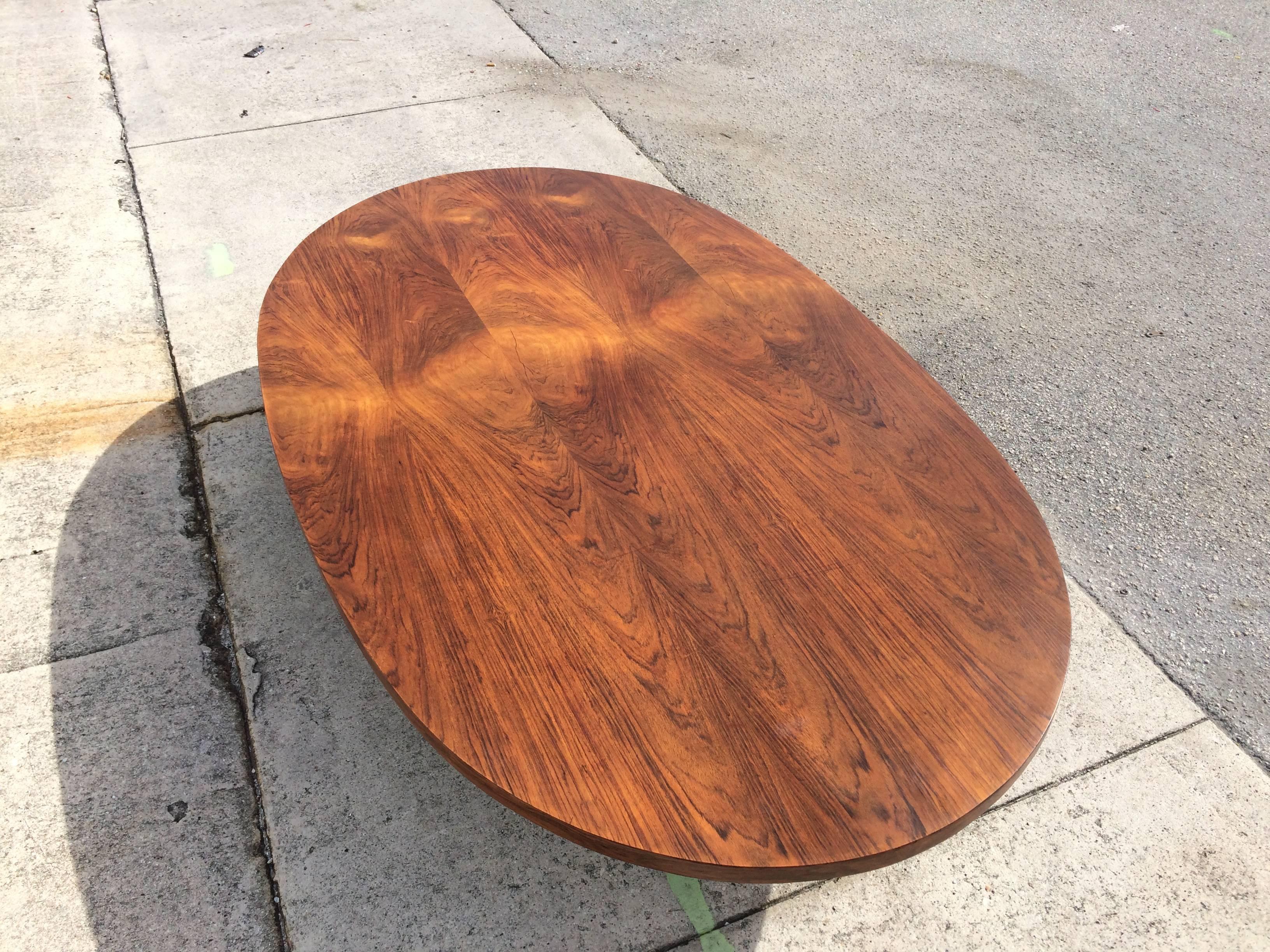 Beautiful rosewood veneered coffee table on chrome base.