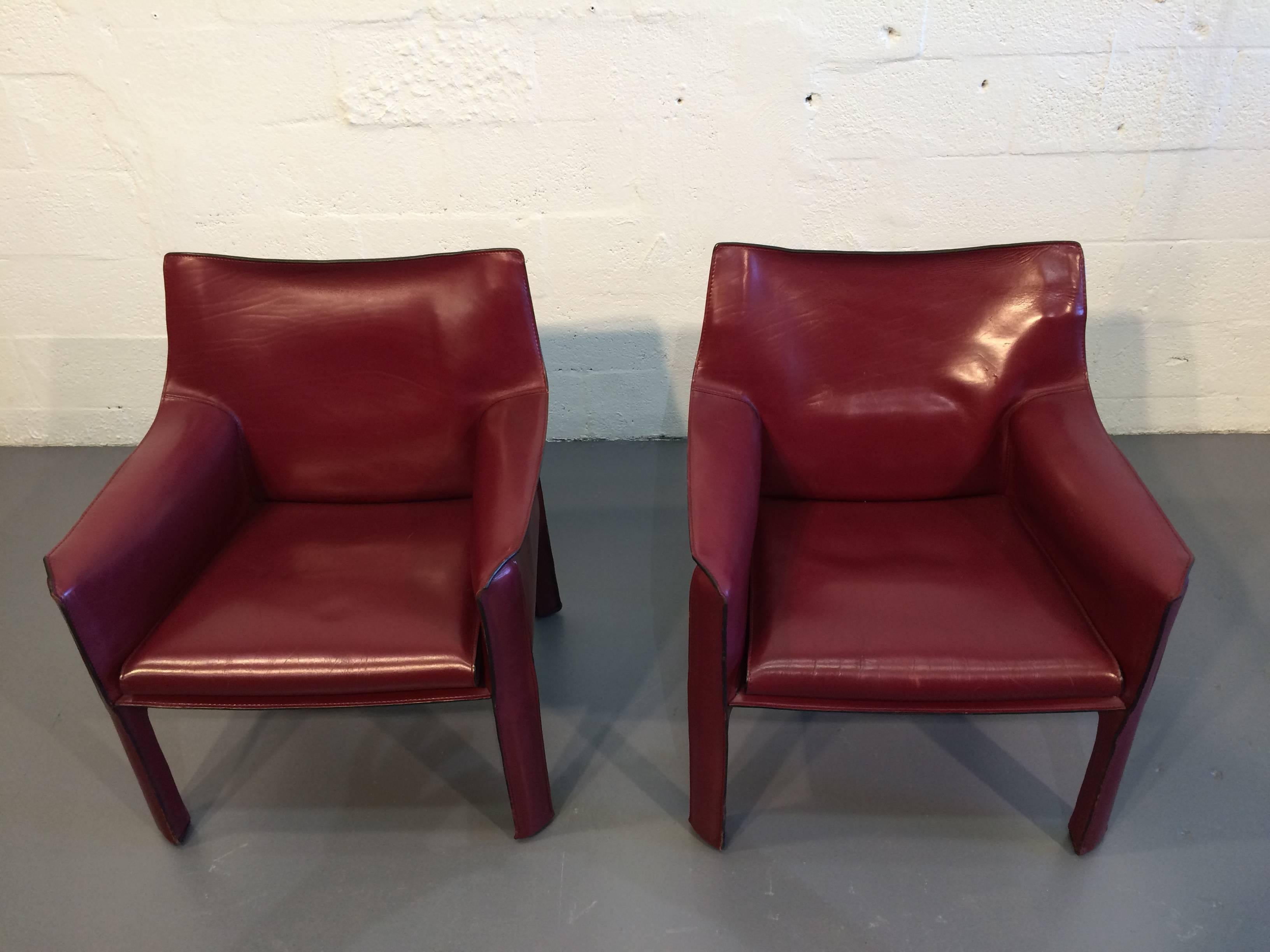 Great Mario Bellini saddle leather lounge chairs made and signed by Cassina.
The leather is a Burgundy color.