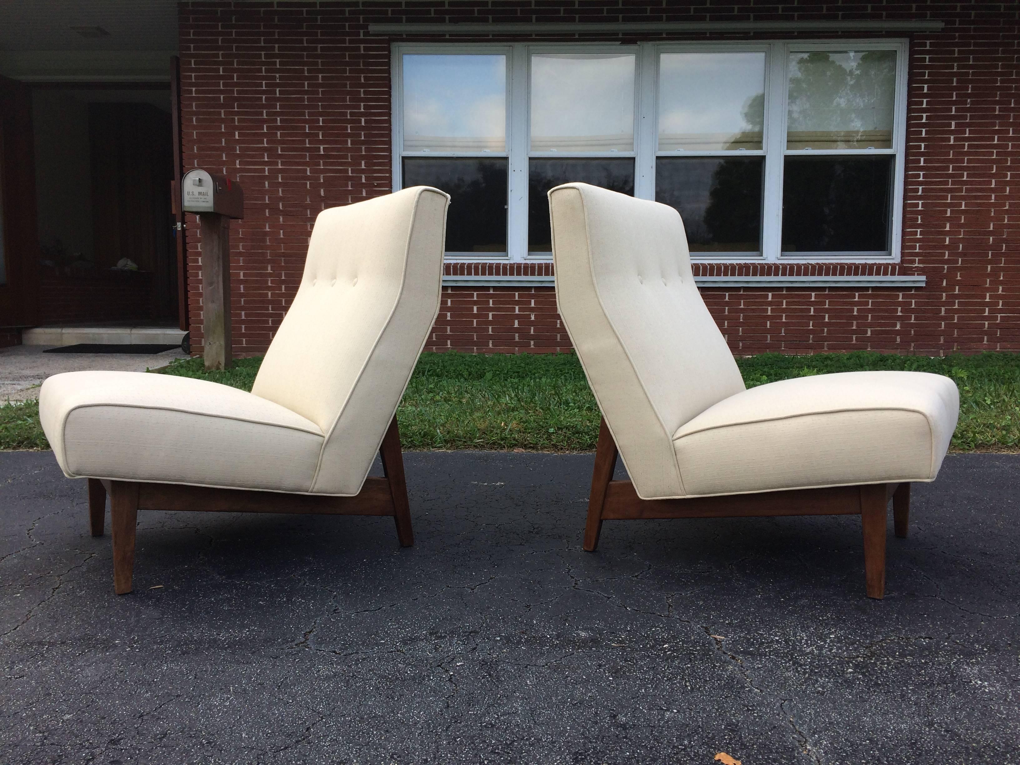 Original Jens Risom lounge chairs, fabric and walnut.