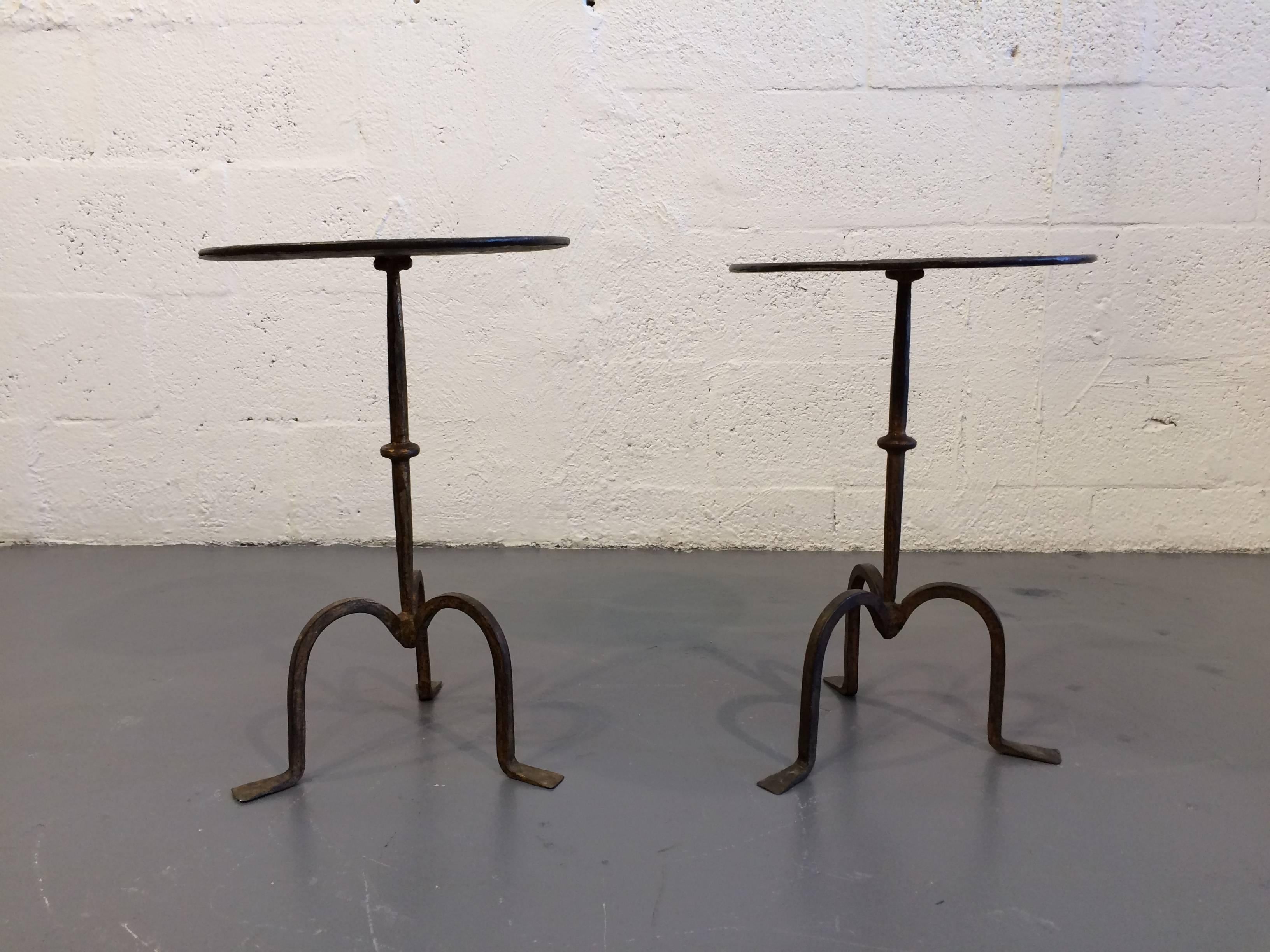 Hammered hand-forged tables. Both tables are 12 inches in diameter. One table is 18.25 inches high and the other is 17.50 inches high.