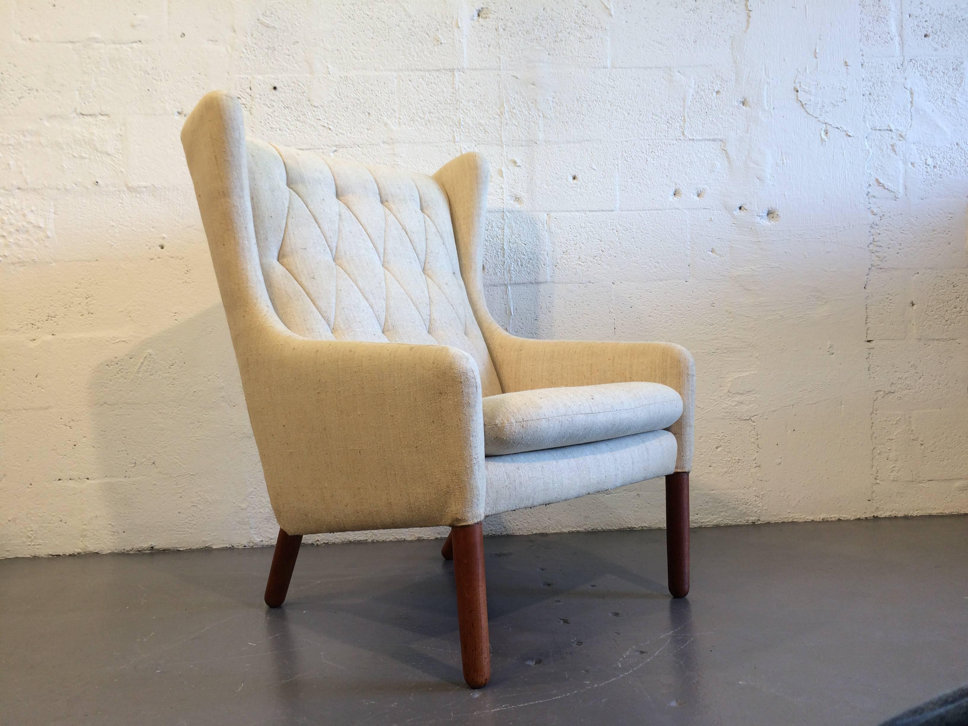 Great chair with handsome oak legs. Chair needs to be recovered. We can help if wanted.