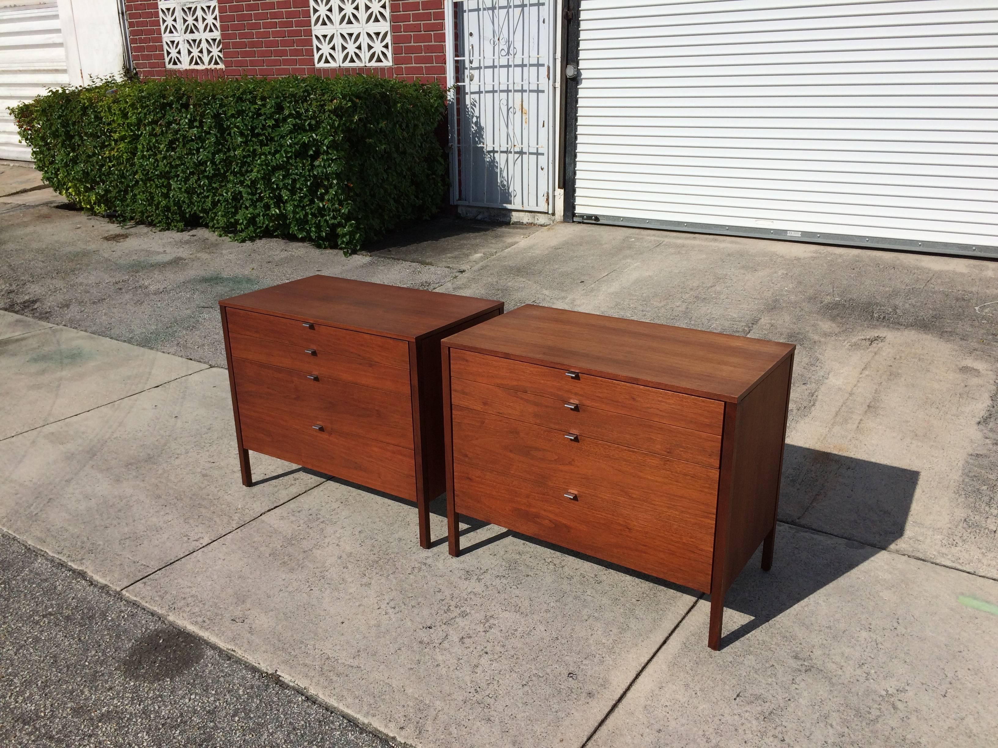 All Walnut chests with white backs, each chest has four drawers.