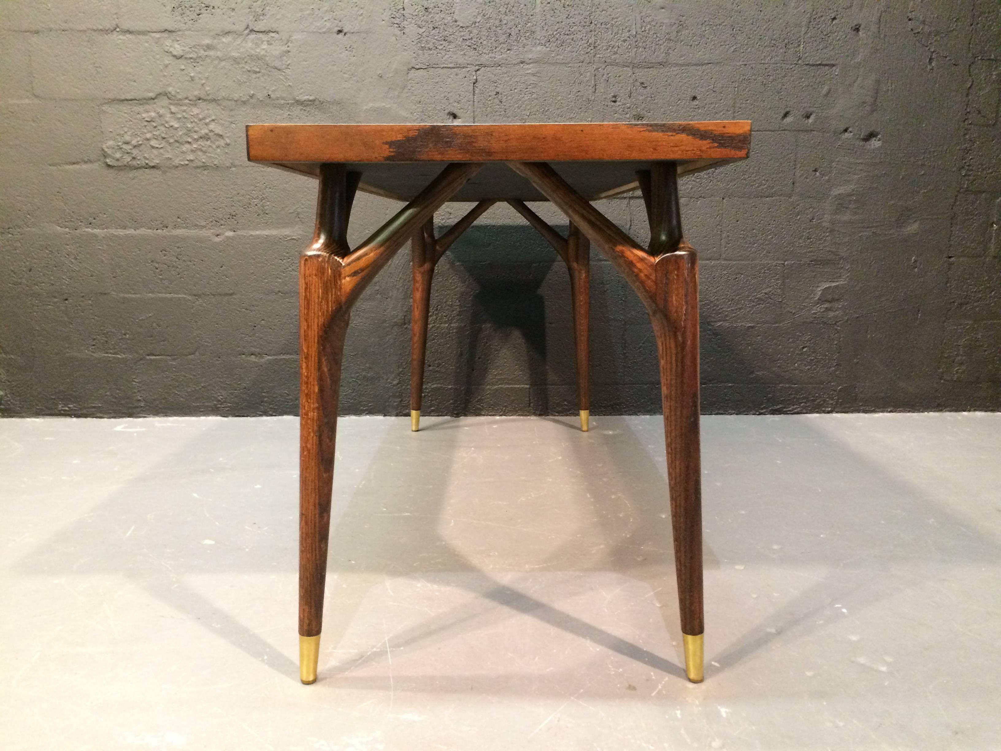 stained oak console table with beautiful legs.