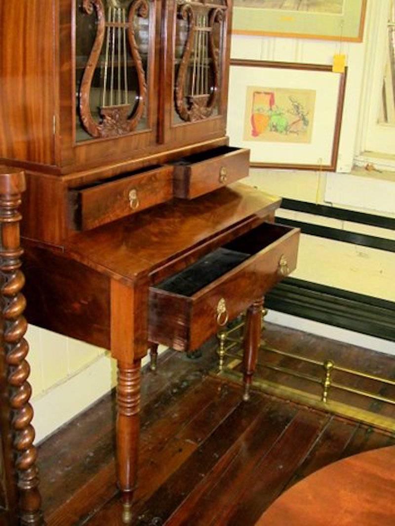Neoclassical 19th Century Federal Period Duncan Phyfe Style Flame Mahogany Secretary Bookcase For Sale