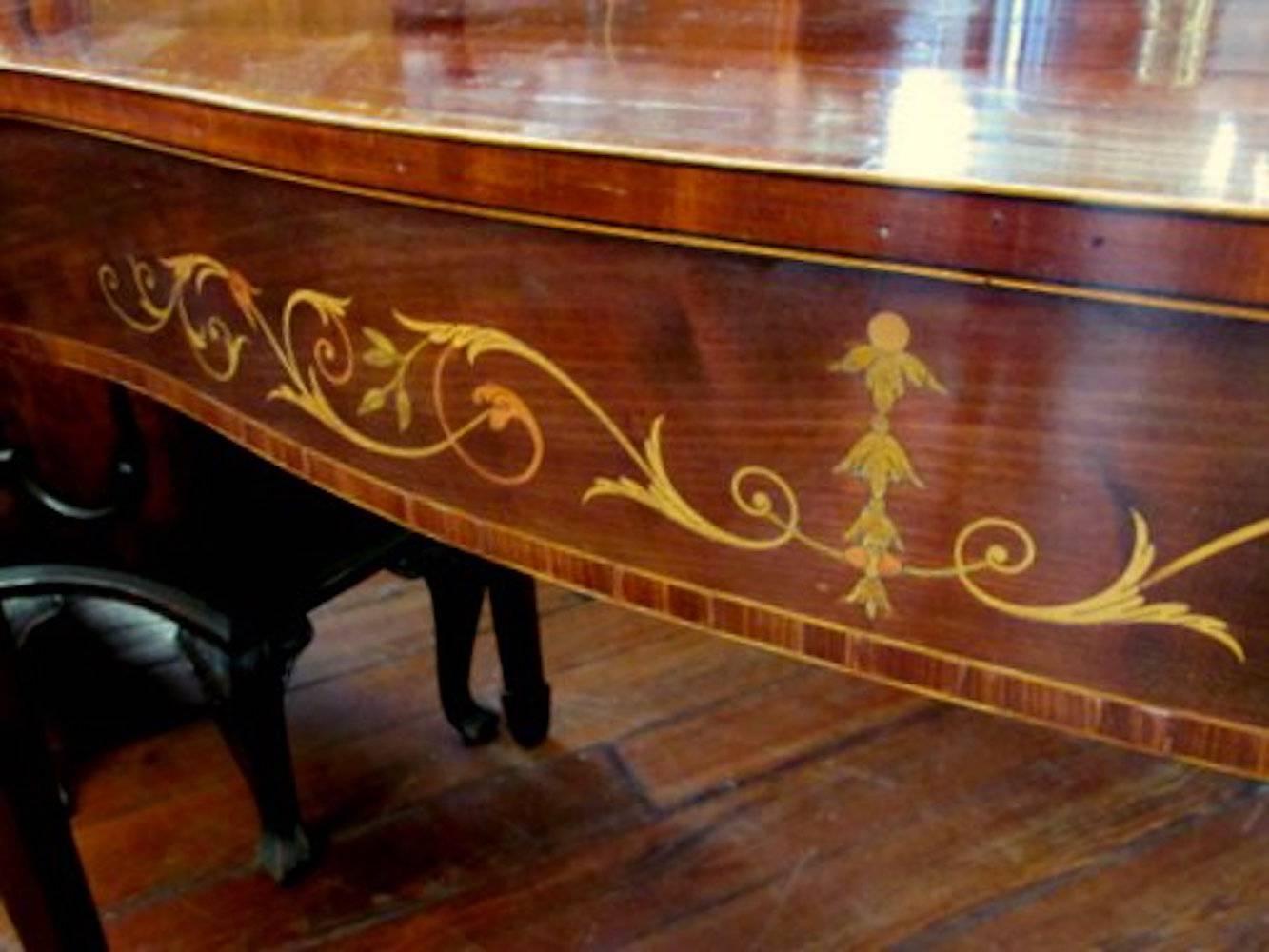 Extremely fine antique English period Geo. III marquetry inlaid figured mahogany Hepplewhite style serpentine console or server with rosewood and satinwood crossbanding.

Please note lovely pierced corner frets and neoclassical marquetry inlay
