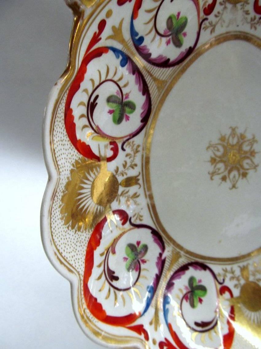 Fine antique English spode porcelain Hand-painted shell-shaped dessert or shrimp dish with fabulous rincent scrolls delicately hand-painted and superbly gilt decoration throughout.

Spode shape noted on pg. 305 of G. Godden's 