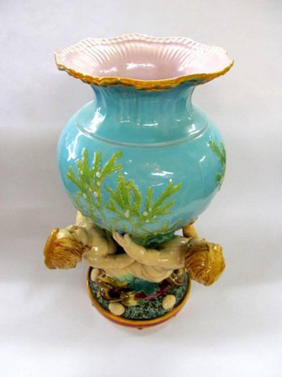 Fine and rare antique English monumental size Minton Majolica mermen and coral aquatic figural vase in pristine condition.
This is the 