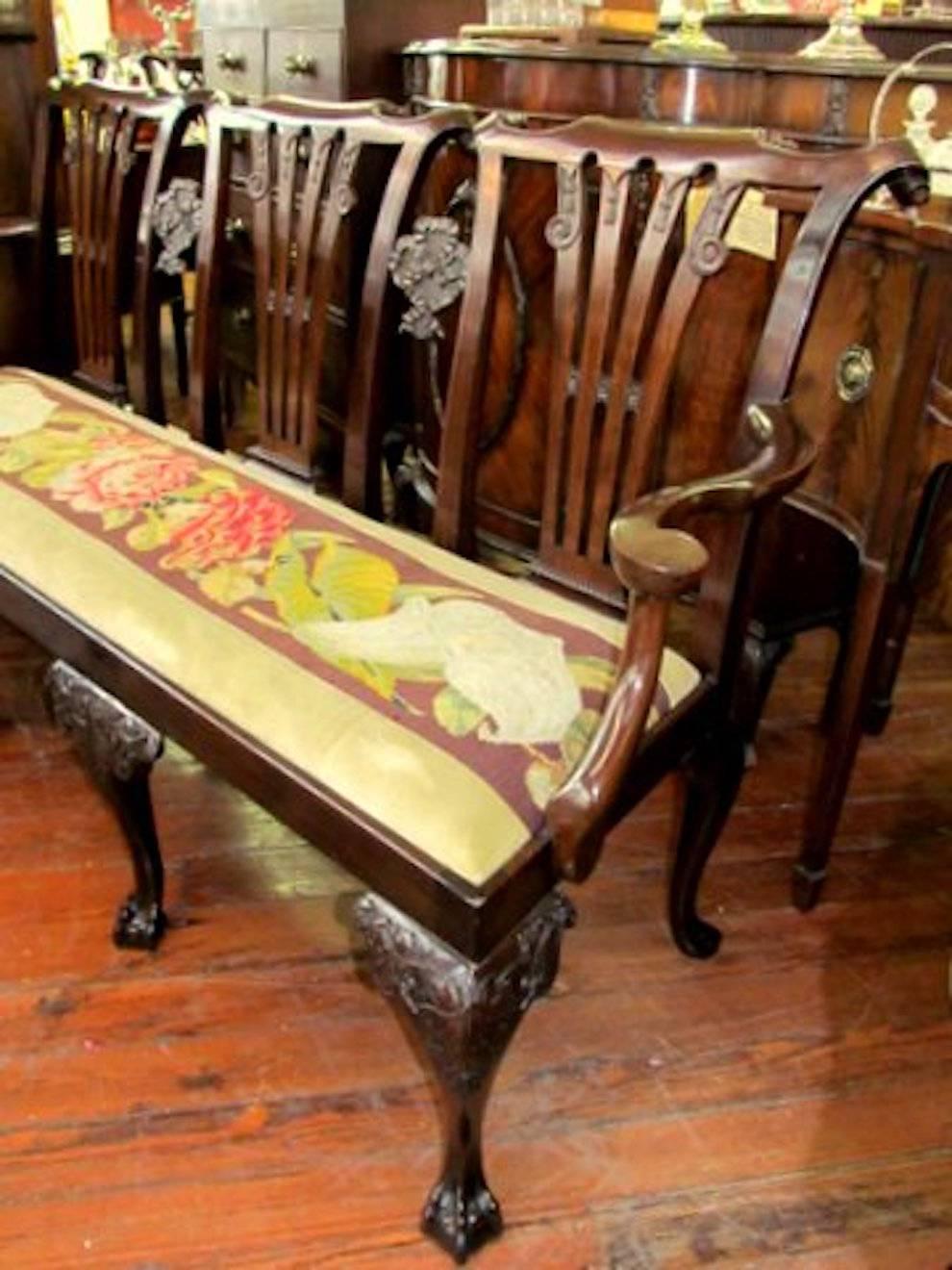 An exceptionally fine and rare antique Irish Chippendale George II style hand-carved solid mahogany triple chairback settee.

Please note exceptionally crisp and deeply hand-carved cabriole legs, back splats and 