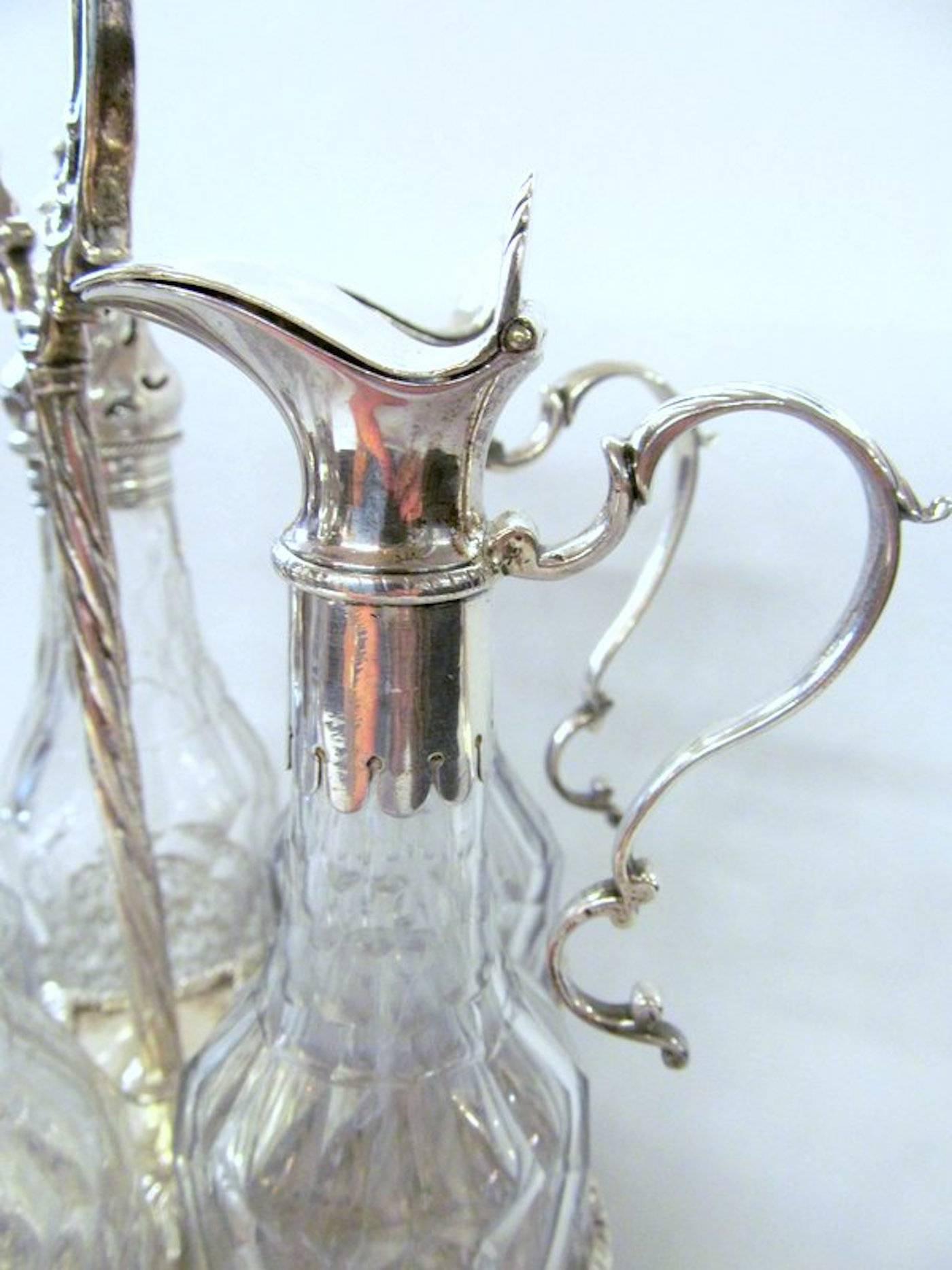 Late 18th Century George III English Sterling Silver Five-Bottle Cut Crystal Warwick Cruet Set
