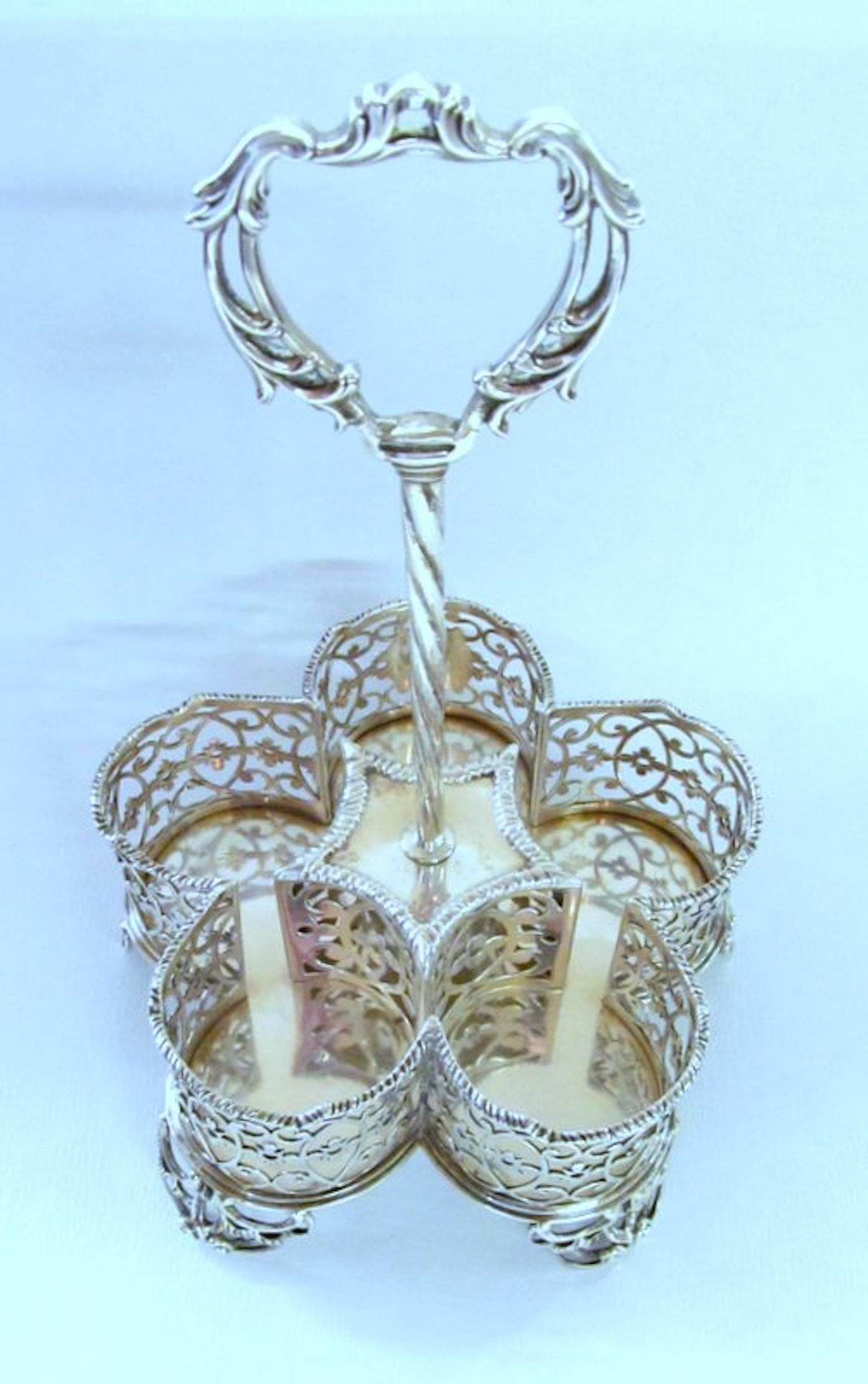 George III English Sterling Silver Five-Bottle Cut Crystal Warwick Cruet Set 1