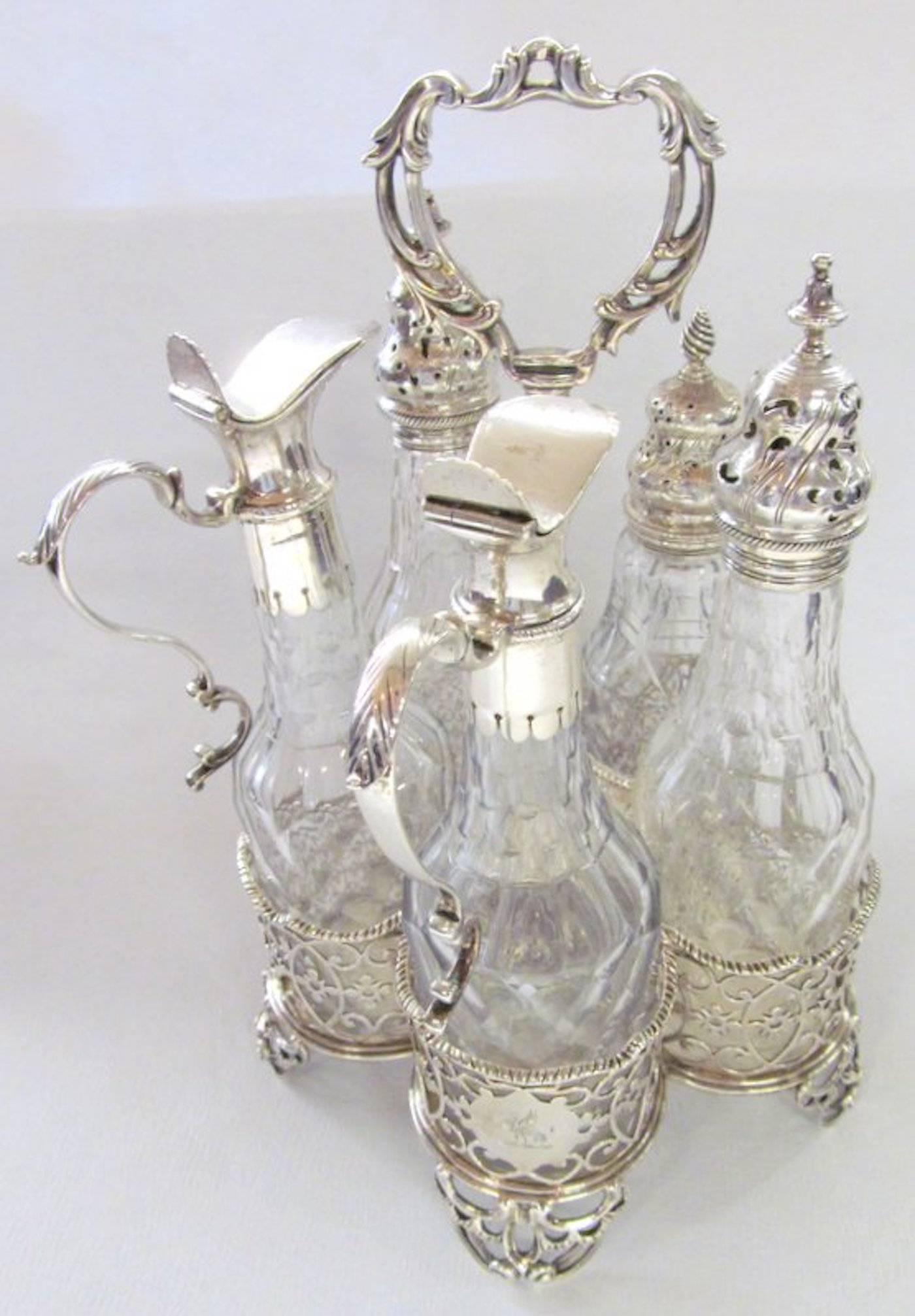 Fabulous and rare George III period five-bottle Warwick cruet set with makers marks and hallmarks for Charles Aldridge and Henry Green, London, 1771-1772.

One of the bottles is not original but is of the period. (Set has been priced accordingly