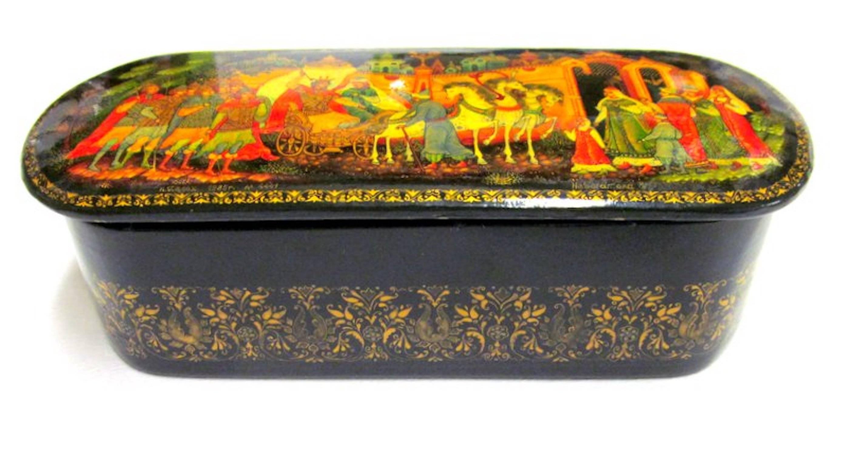 Rare and Fine old Russian hand-painted papier-mache lacquer box.
Signed E. Nebogotova Palekh- USSR, circa 1965-1975.

This is an original by Nebogatova and not to be confused with later commercial lookalikes.