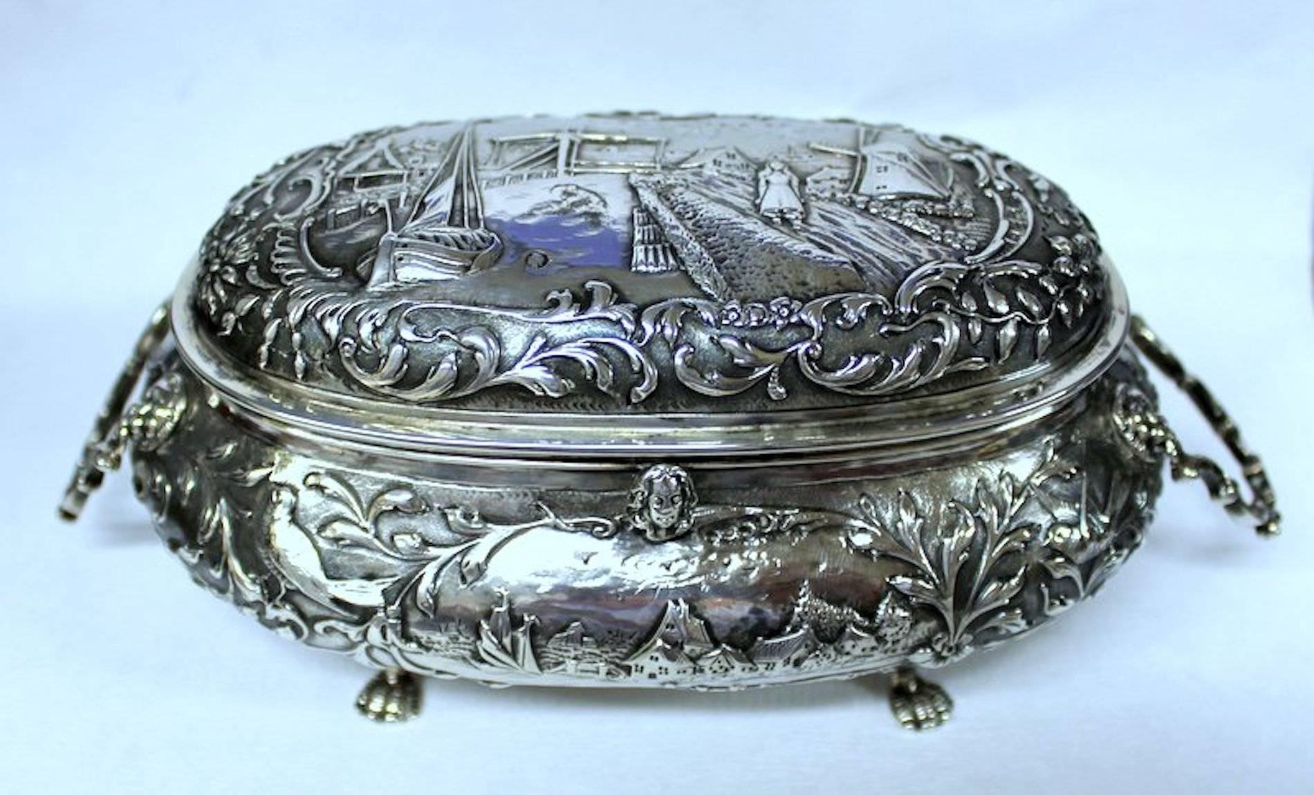 Exceptional large antique Dutch .833 fine silver hand chased casket or hinged box.
Please note exceptional hand chased detail overall, 