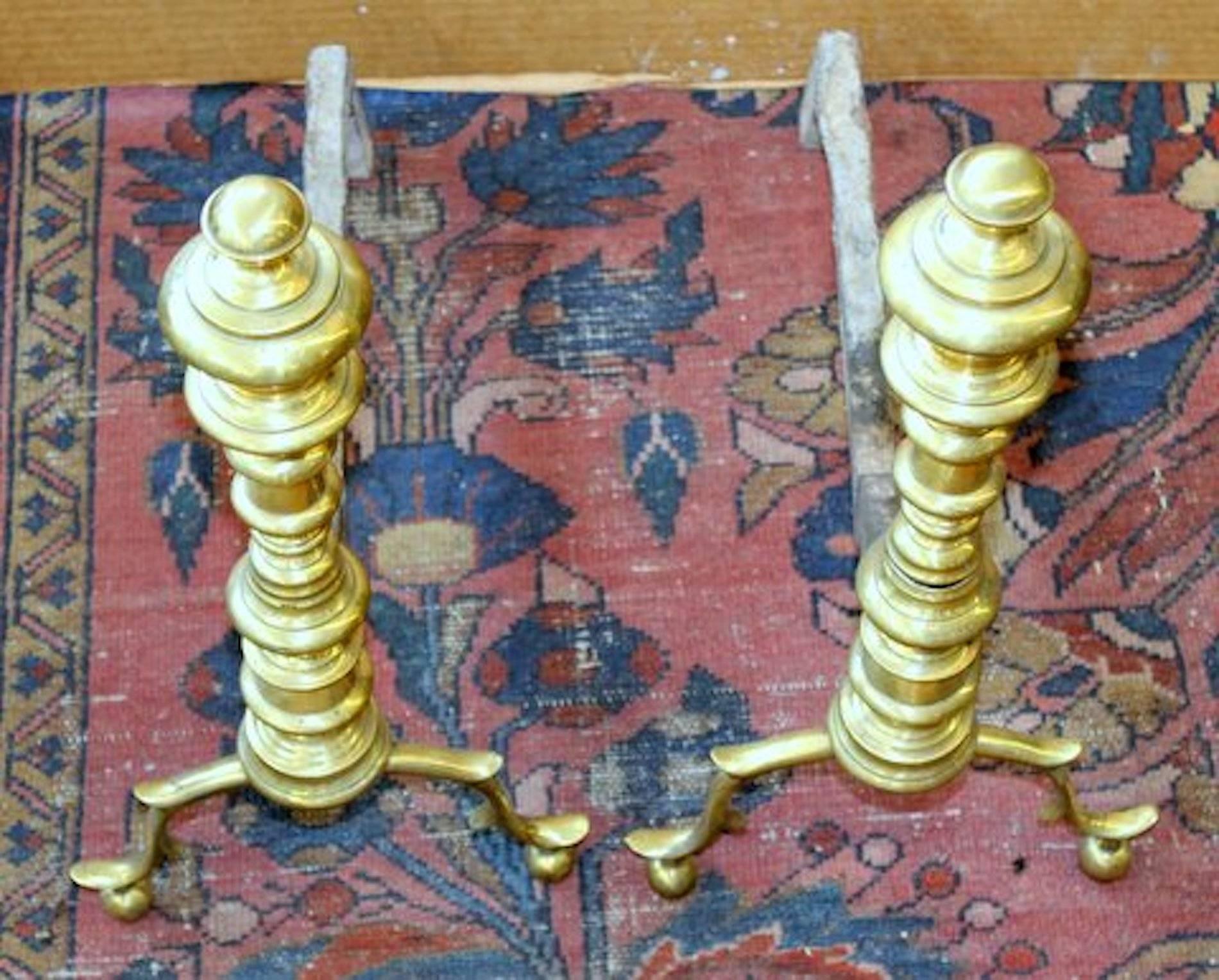 Fabulous pair of early American Federal period brass andirons.