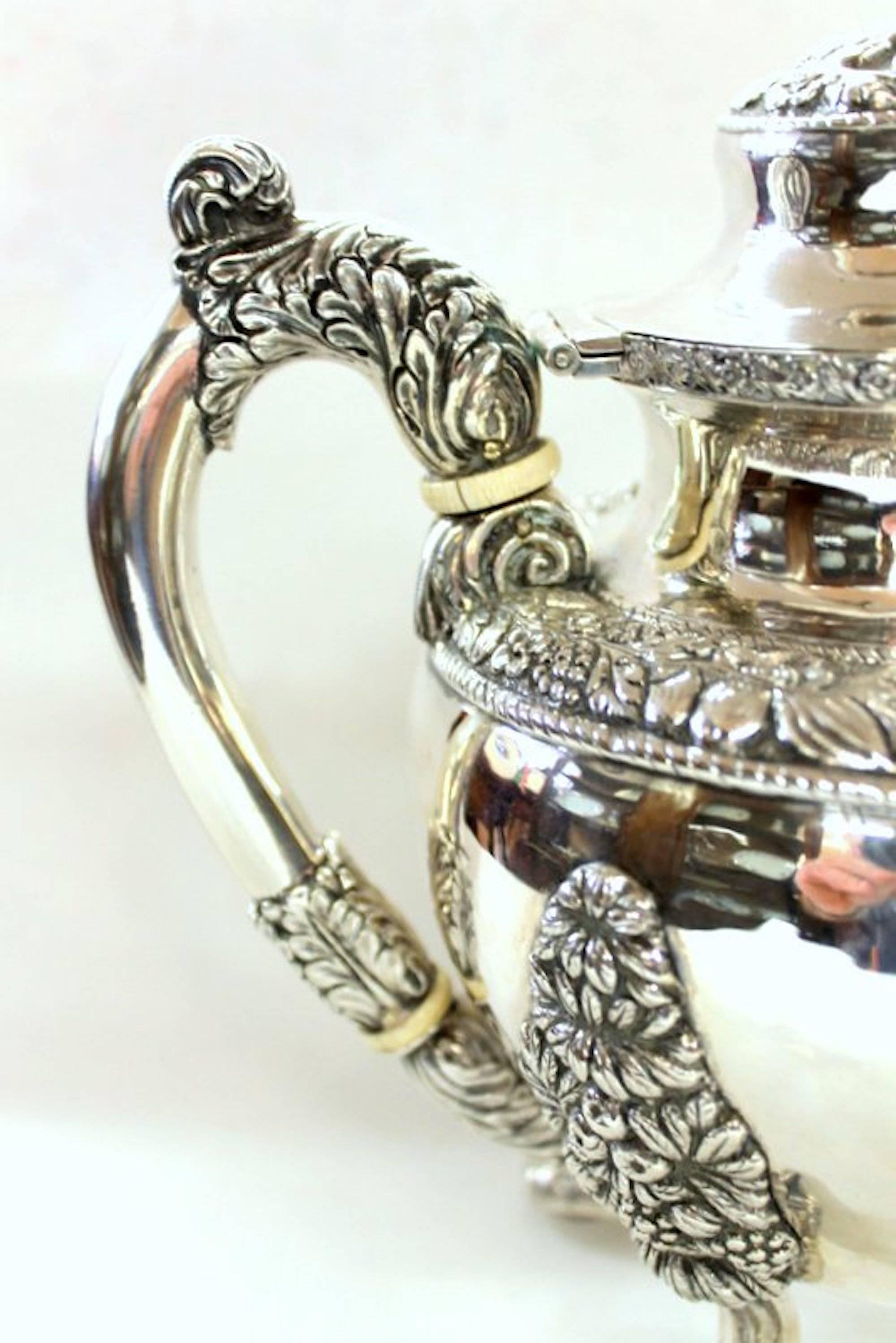 Antique American Coin Silver Rococo Style FourPiece Tea Set by Andrew