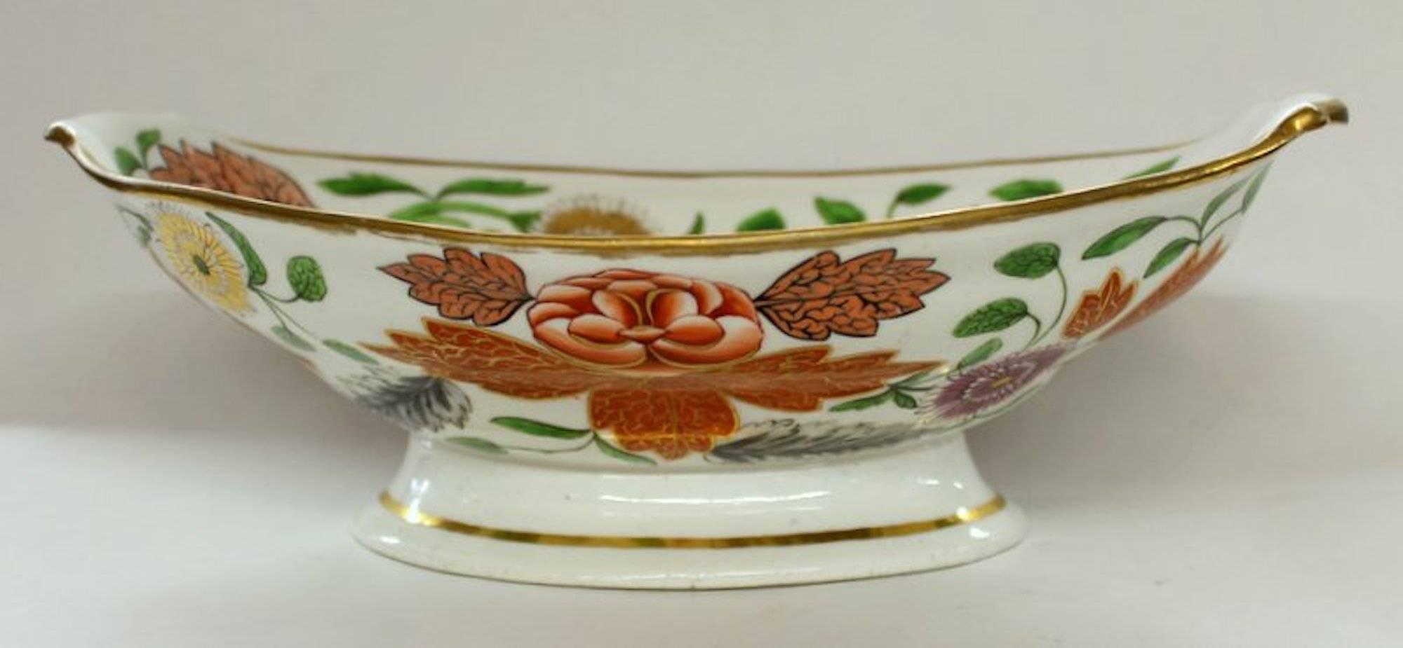 Rare and fine antique English Coalport porcelain highly decorative pedestal compote with fabulous hand-painted floral decor inside and on underside exterior.

Note- there is a firing flaw on the base which is not a crack (as illustrated).

Rare
