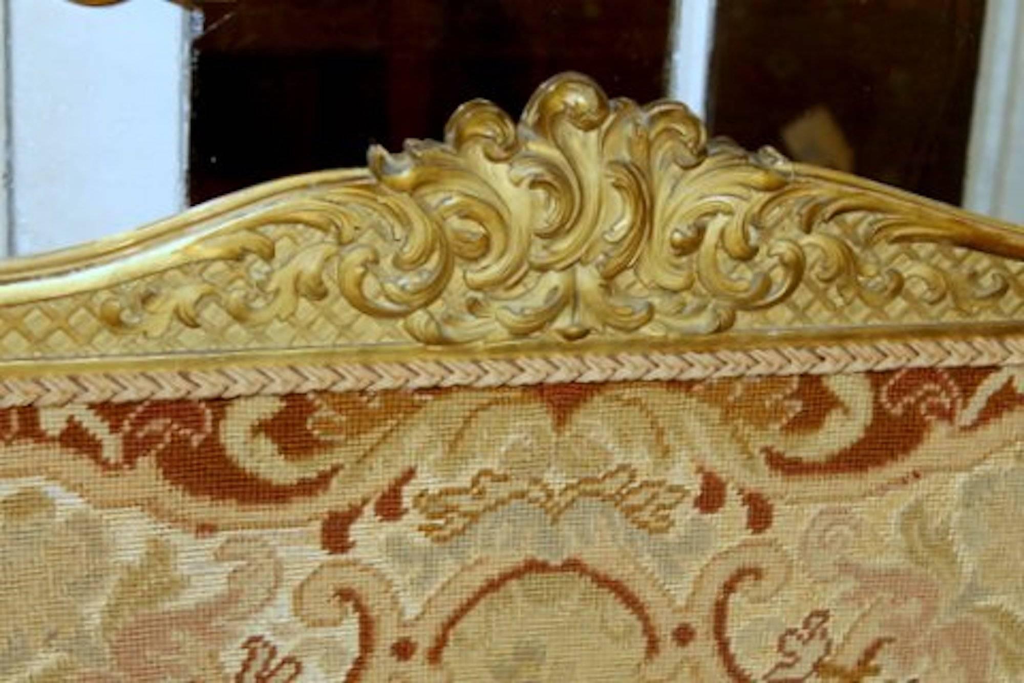 a carved giltwood firescreen