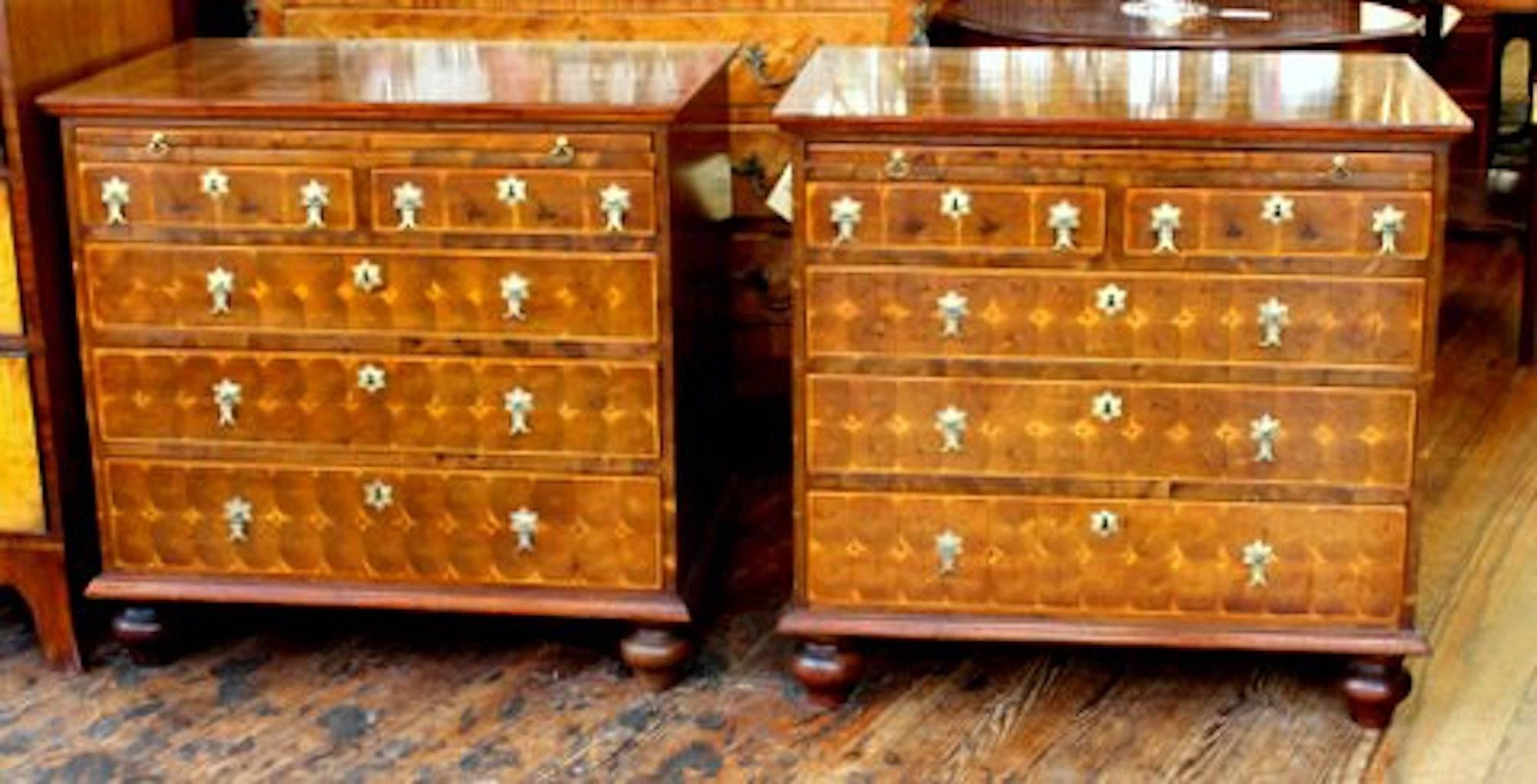 Pair of exceptionally fine and rare antique English oyster veneer laburnum and walnut Queen Anne Revival bachelor's chests with brushing slides and period style brasses. Please note the fabulous 
