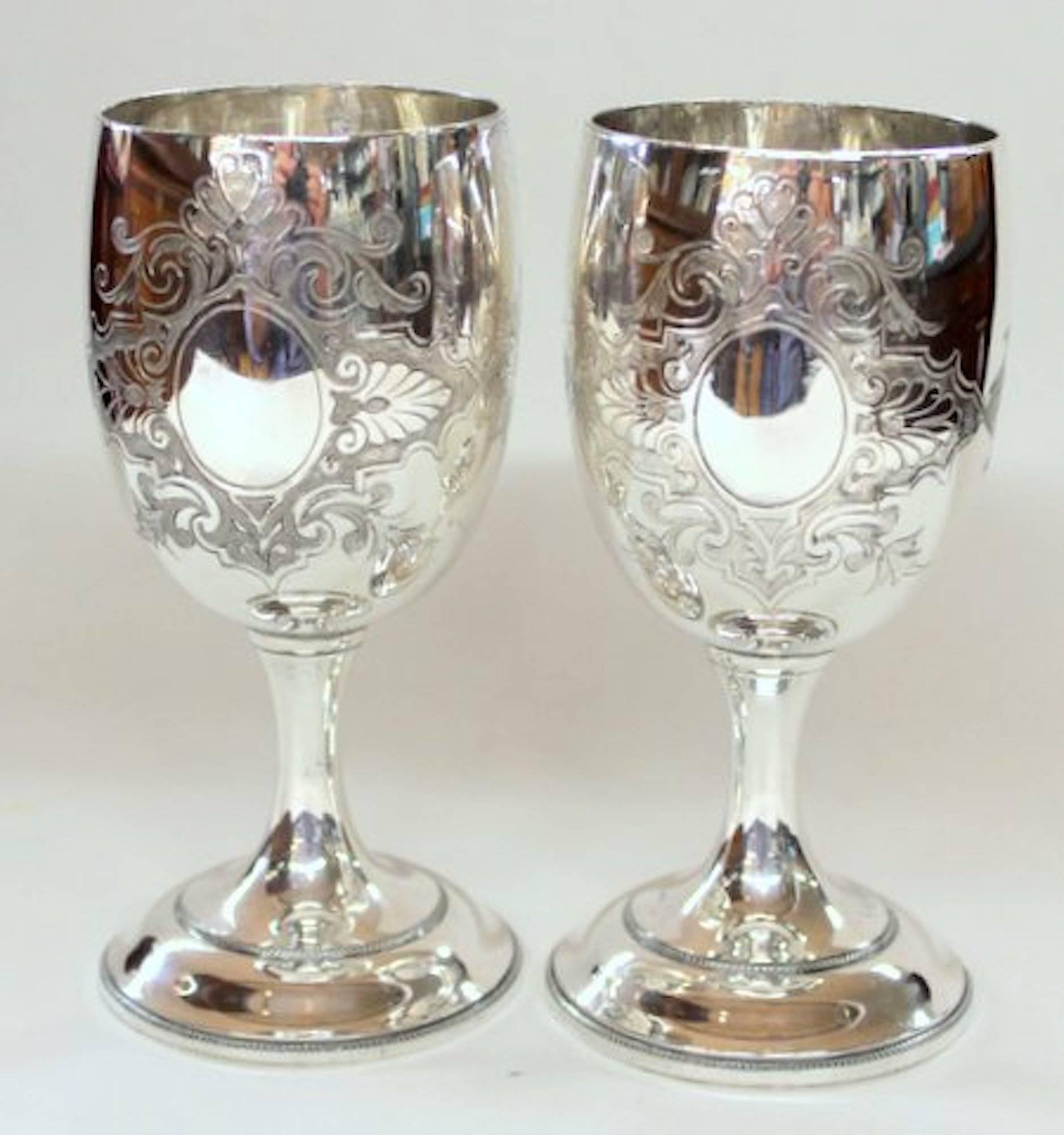 Rare pair of antique American silver plate hand chased and engraved goblets. Please note the fabulous hand engraved motif of the church to the obverse and a plain open cartouche suitable for inscribing on the reverse. Also, fabulous hand engraved