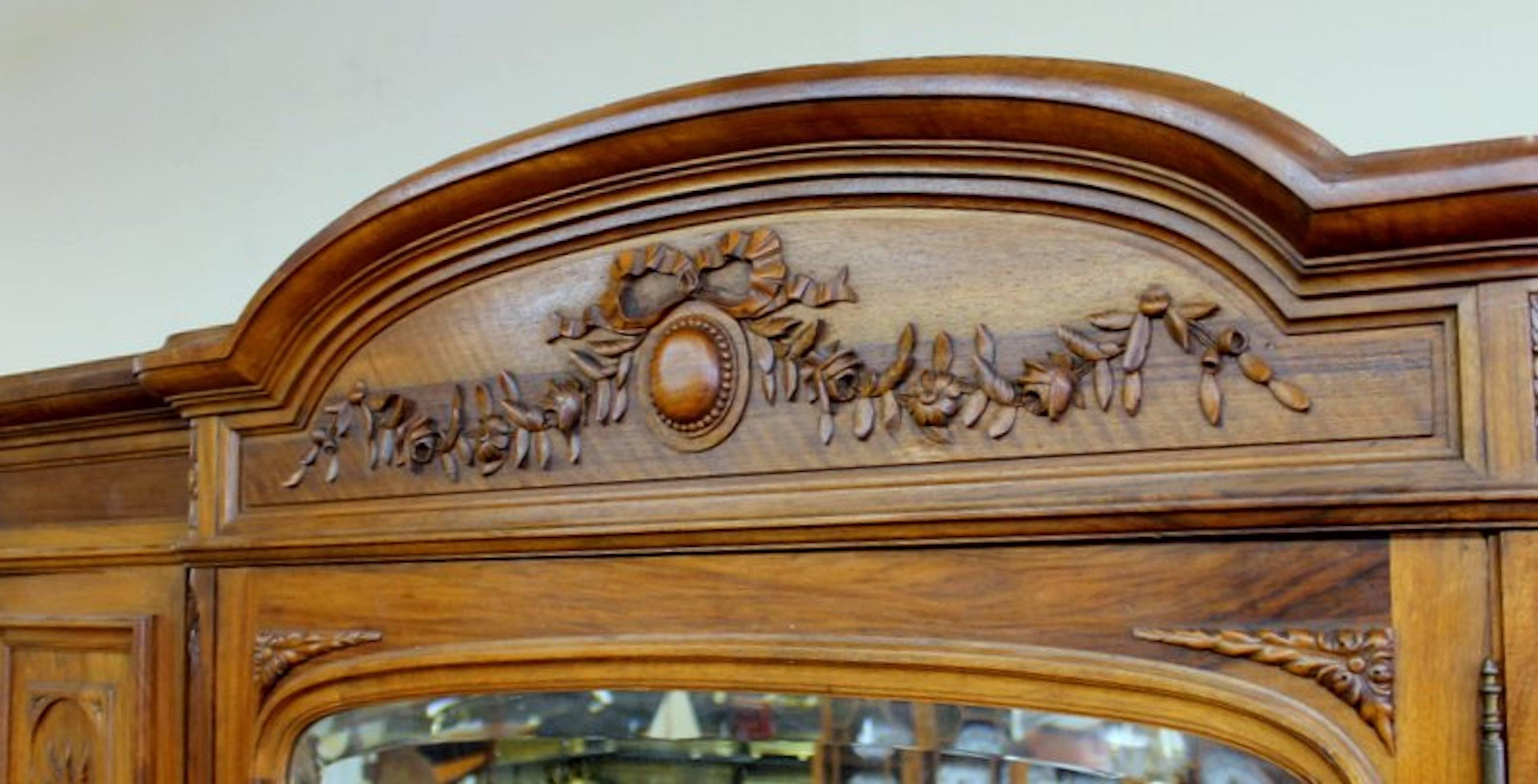 Superb Old French Hand-Carved Walnut Louis XVI Style Compactum Wardrobe In Excellent Condition In Charleston, SC