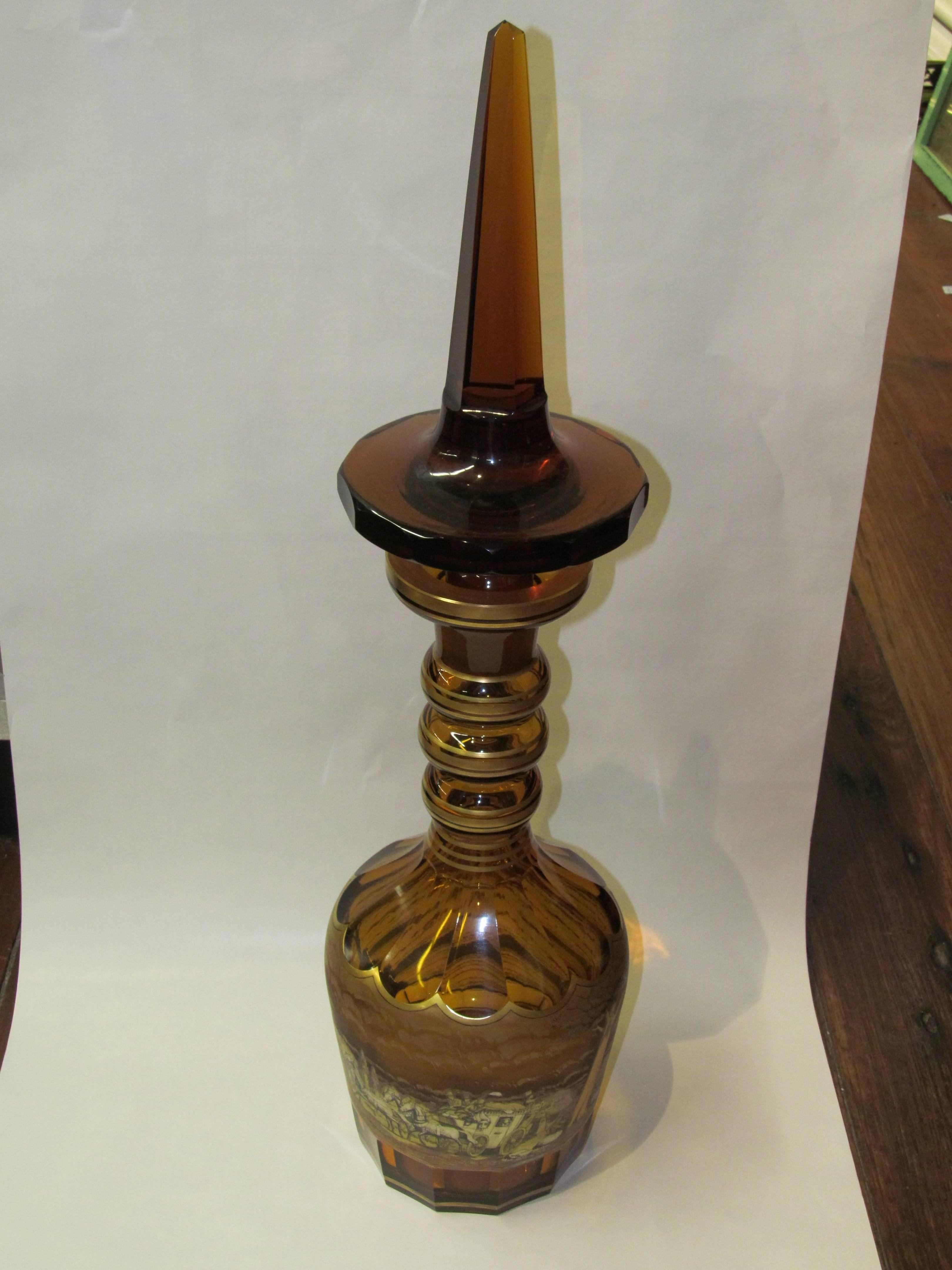 Rare and important old bohemian or Moser amber cut crystal palatial size decanter with hand-painted coach scene, signed by the artist but illegible. This decanter is nearly 30 inches tall with its stopper inserted. It is pristine with no wear