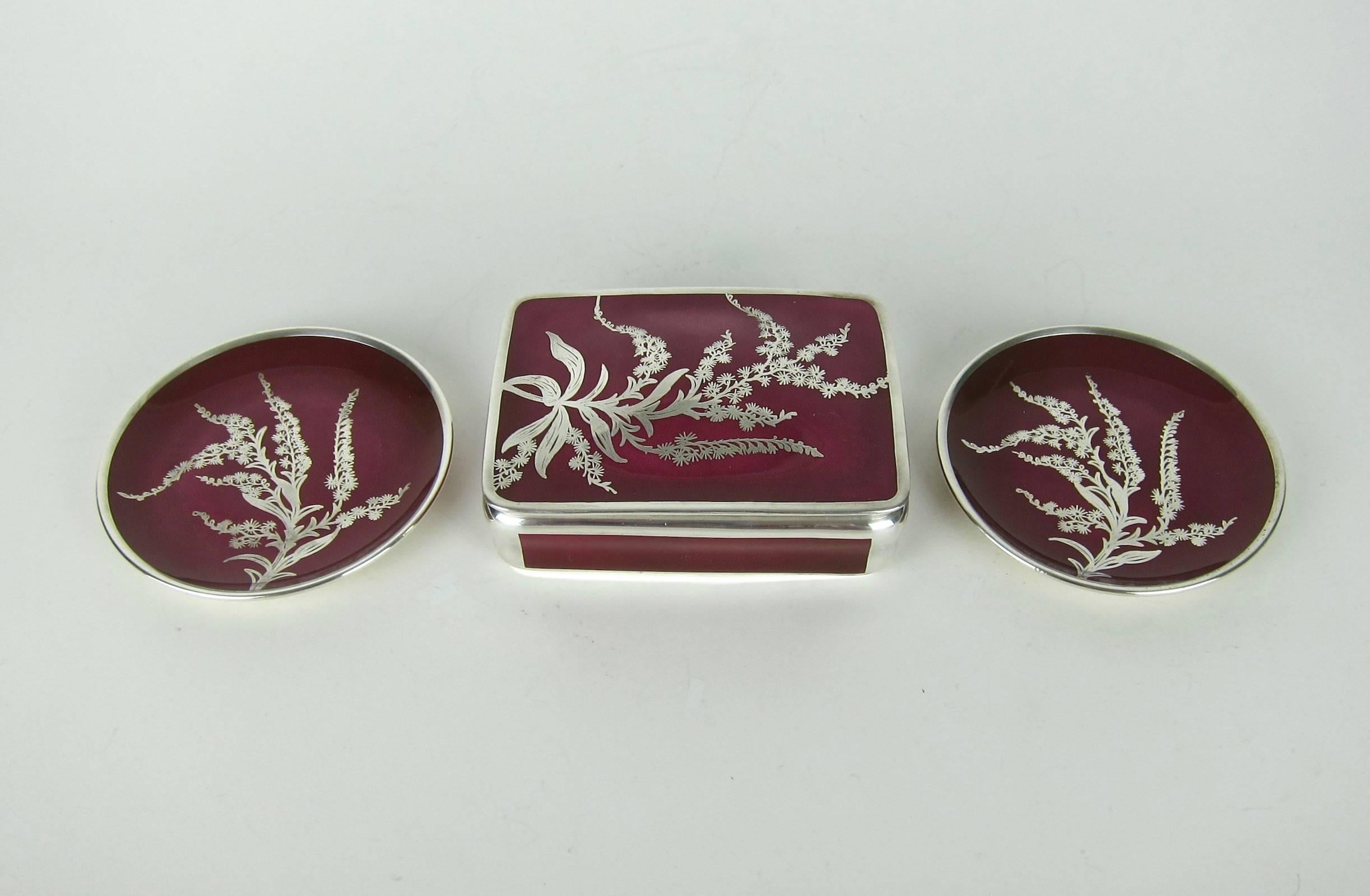 An exquisite vintage smoking or vanity set with an intricate botanical theme in the Art Nouveau style by Manfred Veyhl of Germany, active 1928-1950s. Each piece is in very good condition and inscribed 1000/1000 signifying a pure silver overlay