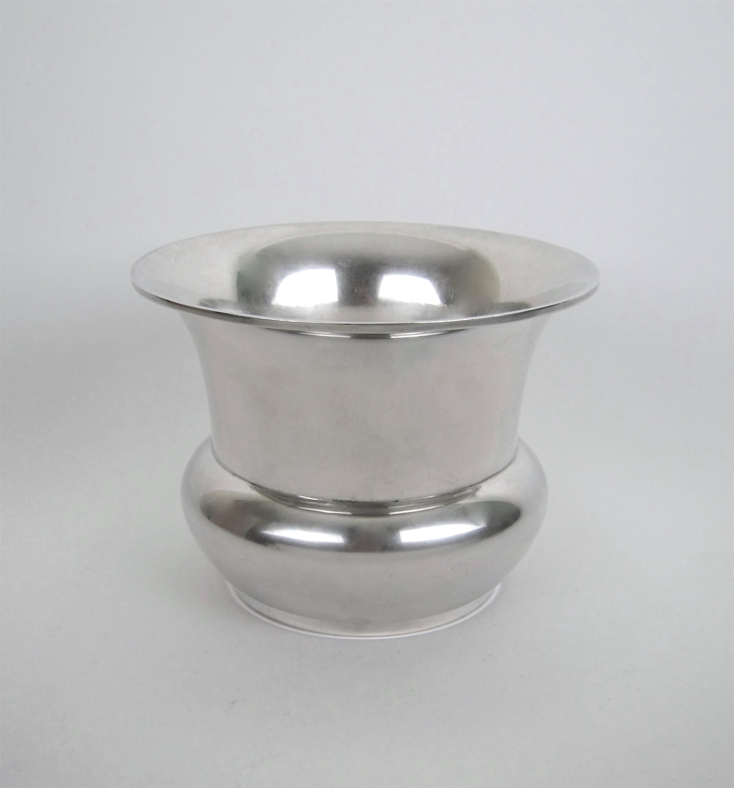 An American sterling silver vase with a flaring, wire-wrapped rim by Marie Zimmermann (1879-1972), a noted metalsmith, jeweler and designer active during the opening decades of the 20th century. The vase comes from the silversmith's estate and dates