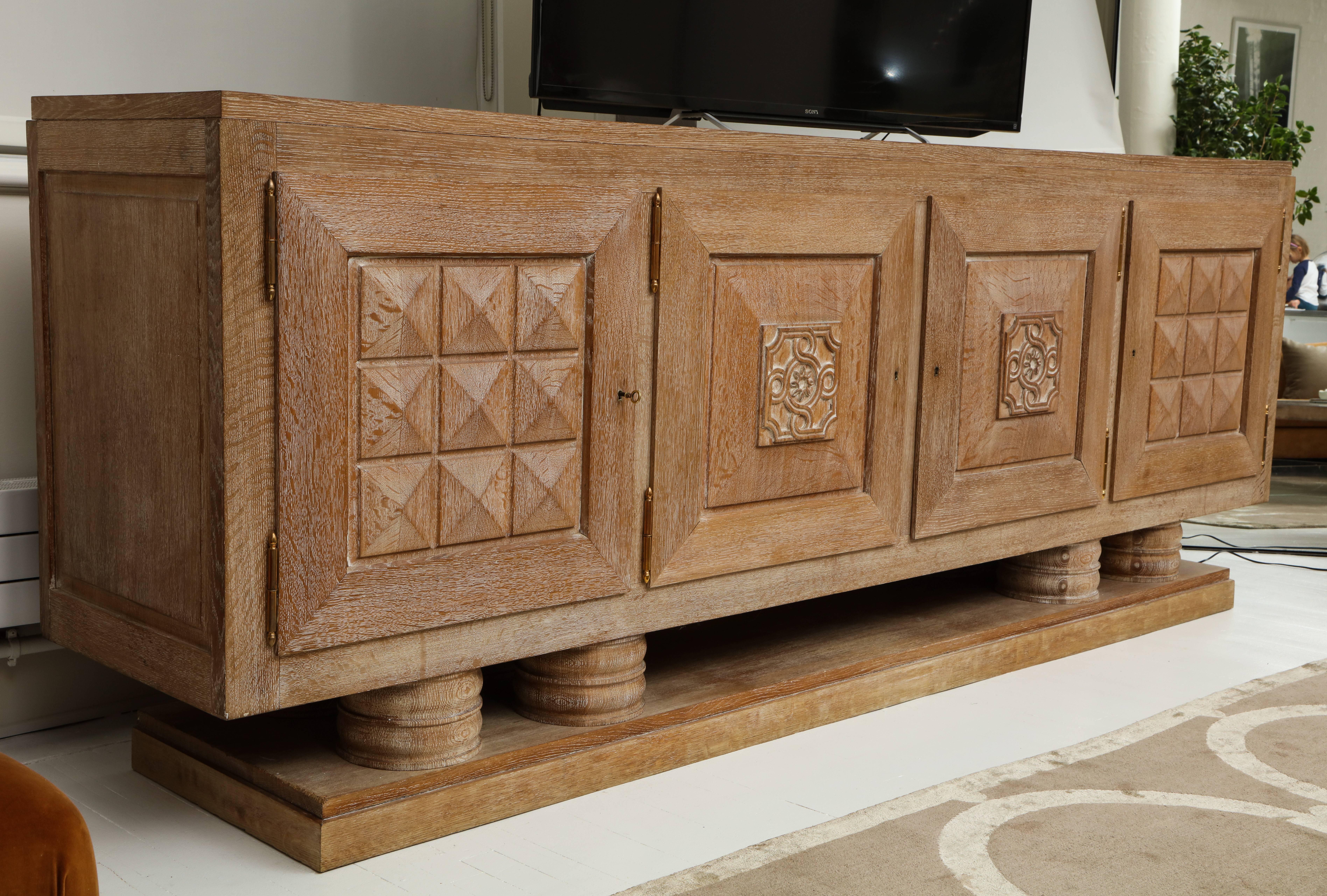 Monumental cerused oak Art Deco sideboard, France, 1930s

Very large and heavy cerused oak sideboard from France with bronze detailing. In beautiful condition. You can see the incredible workmanship in all the details. Includes original