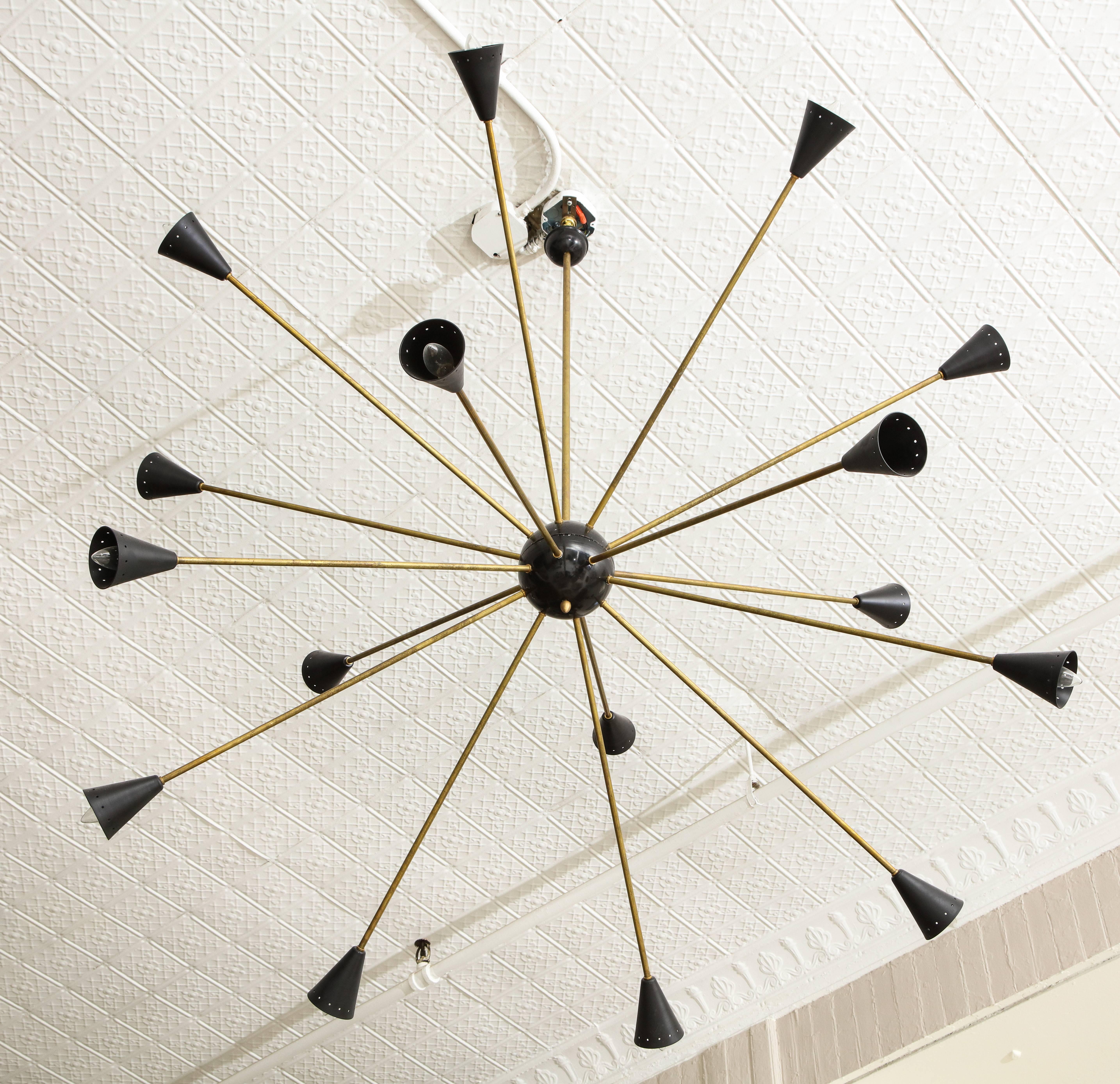 Large 16-arm Sputnik brass black, Stilnovo style Italian Mid-Century, 1950-1960

Lovely patina to the brass. Large Sputnik Italian chandelier. Rewired for US.

Height: 54 inches
Diameter: 5 feet.
