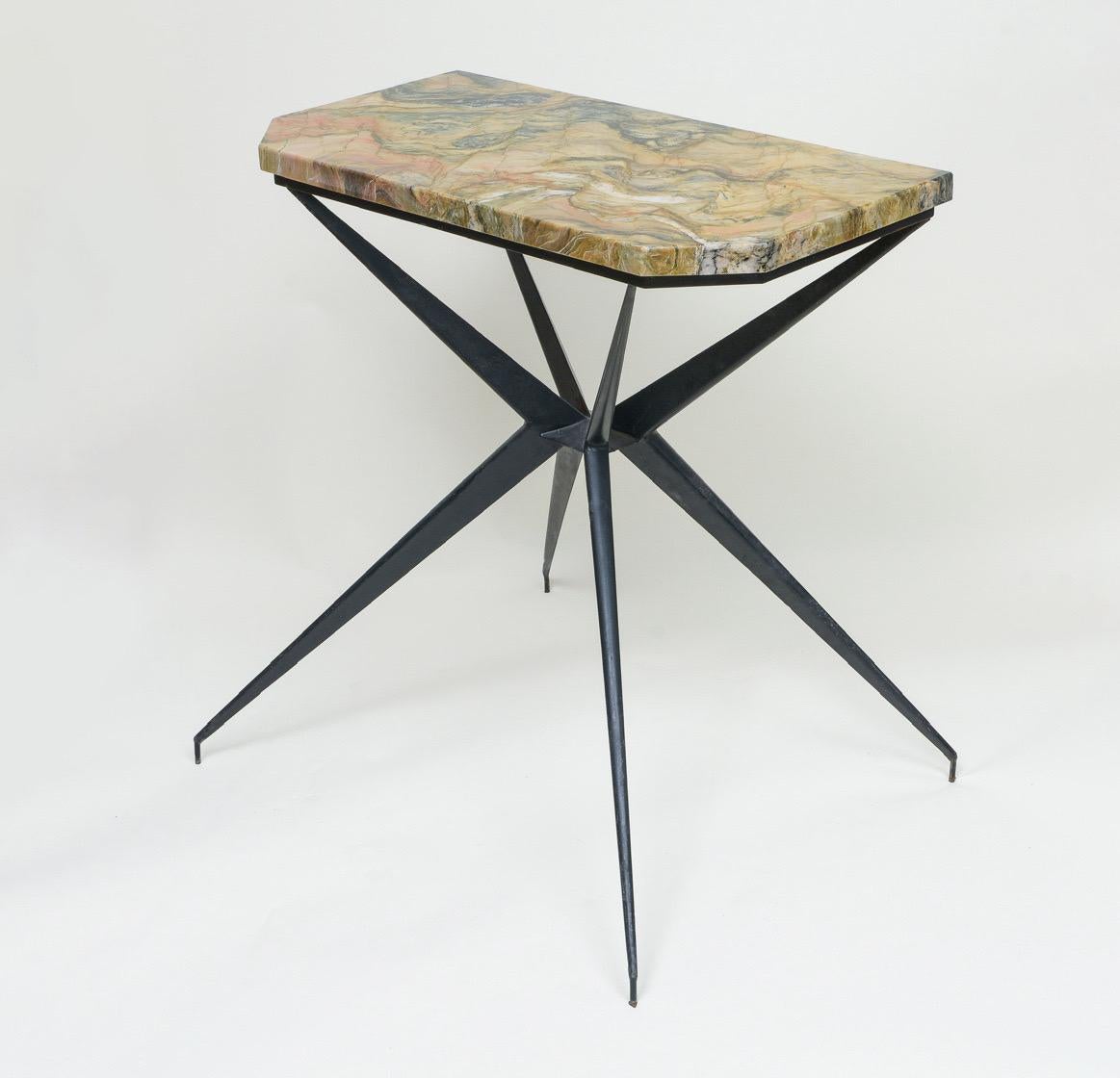 Mid-Century black iron console table with marble top, Italy, 1960s

Unusual console table with iron legs Mid-Century, Italian. 
Elegant piece.

Size: 
28 inches wide
13 inches deep
29 inches high.

Same era as: Charlotte Perriand, Jean Prouve,