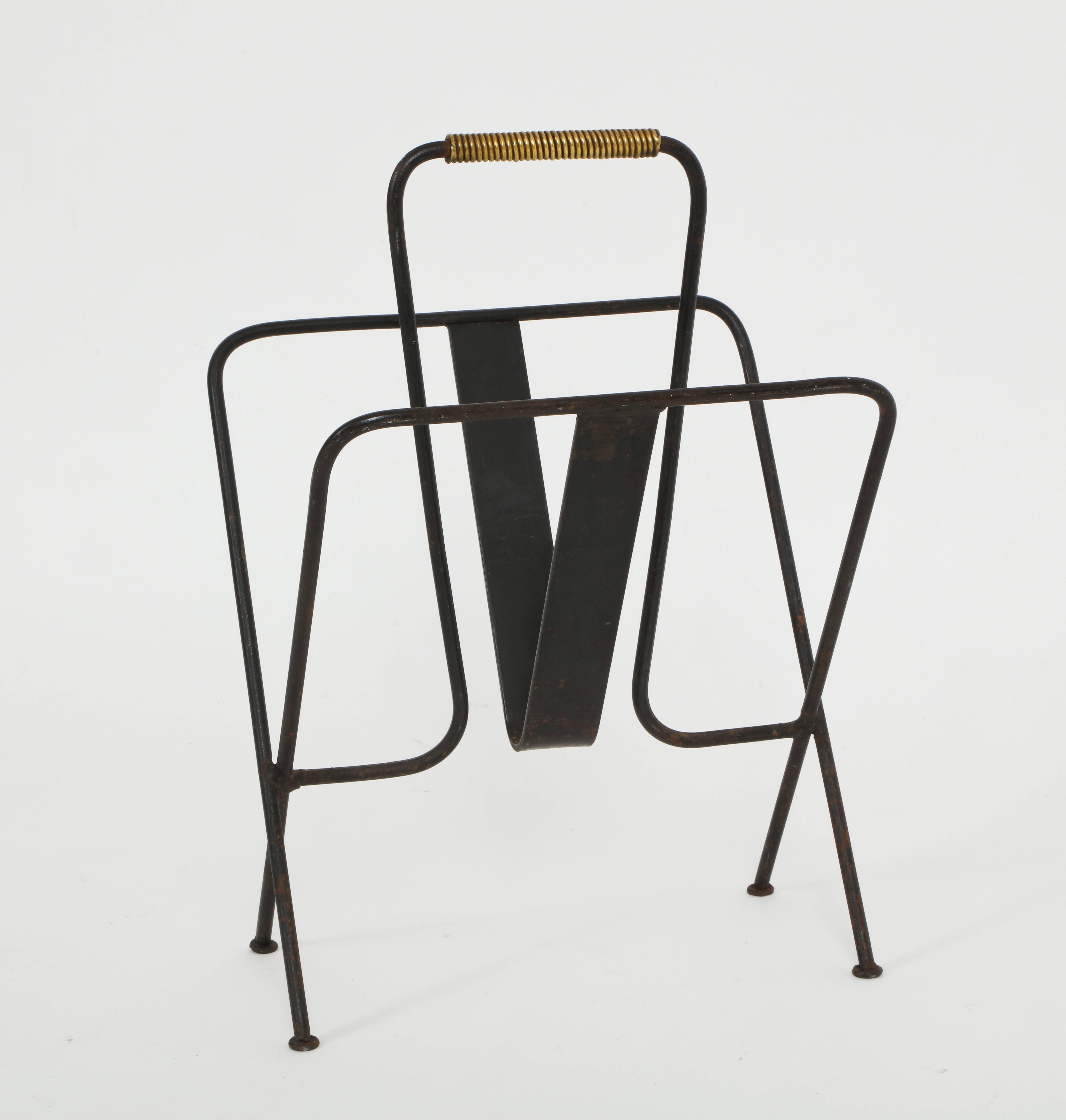 Jacques Adnet iron magazine rack midcentury, 1940, 1950, France.

Classic Jacques Adnet magazine rack with brass trim on top.

Same era as: Charlotte Perriand, Jean Prouve, Pierre Pauline, Serge Mouille, Jacques Adnet, Jean Royere, Roger Tallon,