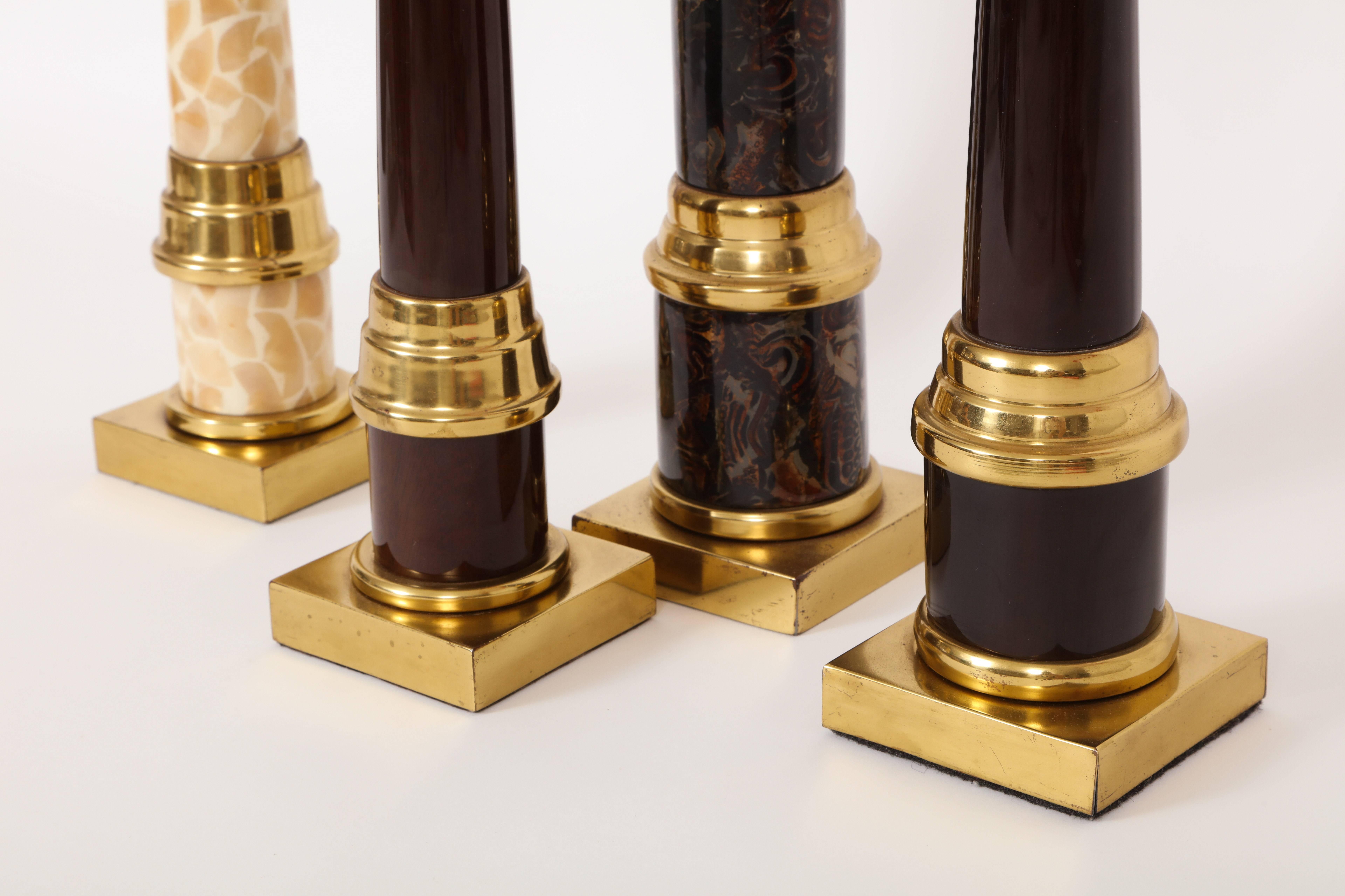 Enrique Garcel tesselated bone shell lacquer brown brass candleholders, 1970 1980.

Four candleholders that each have a different type of organic material. Work together in size and scale. Enrique Garcel stickers on two of the holders.

1: 18