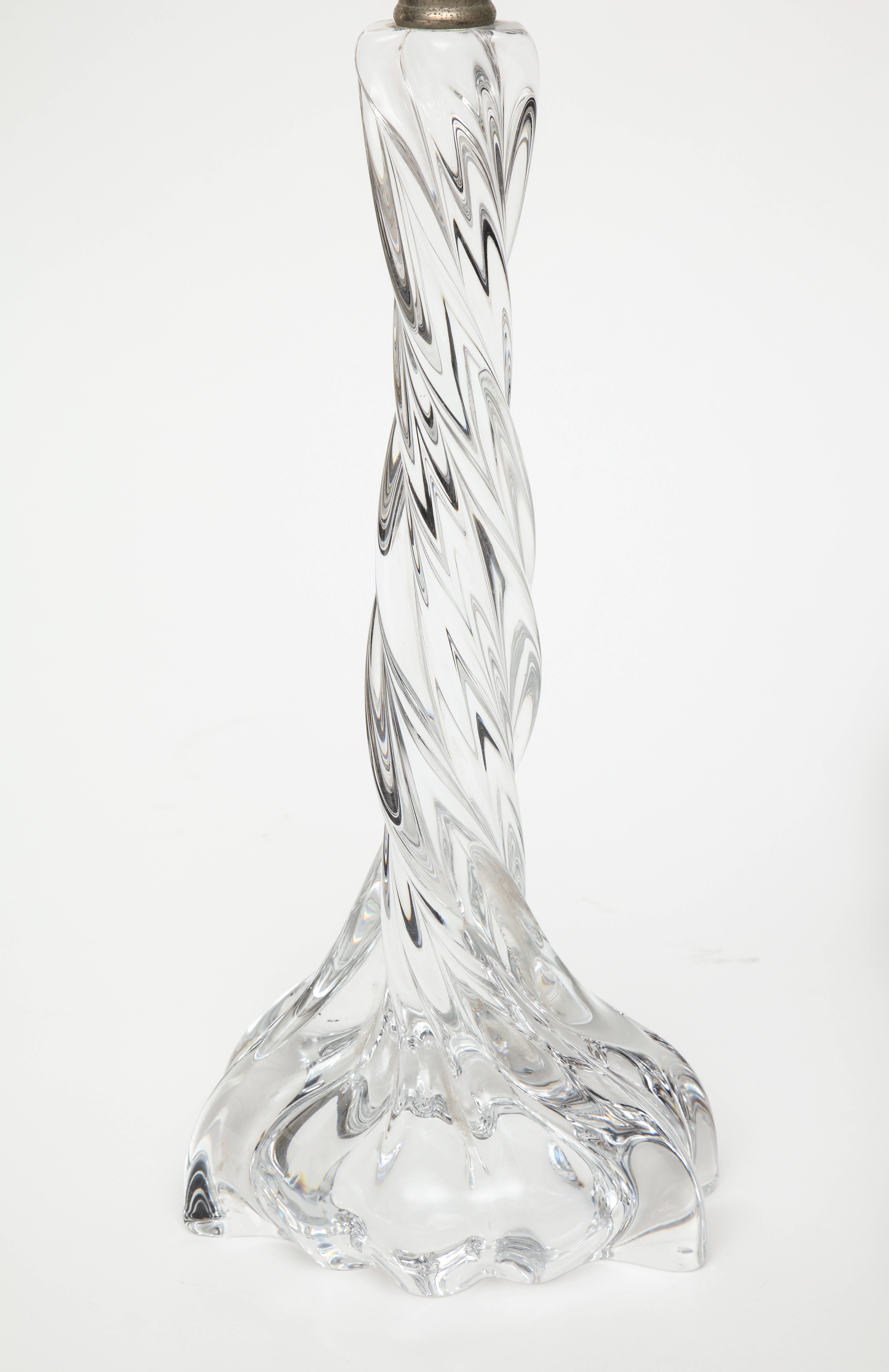 Baccarat crystal desk lamp France with beautiful twisted pattern. Very heavy. 
Weighs over 9 pounds without the shade.
Elegant and Modern.

15 inches to top of the crystal
7 inches diameter base
27 inches to top of lampshade

History of