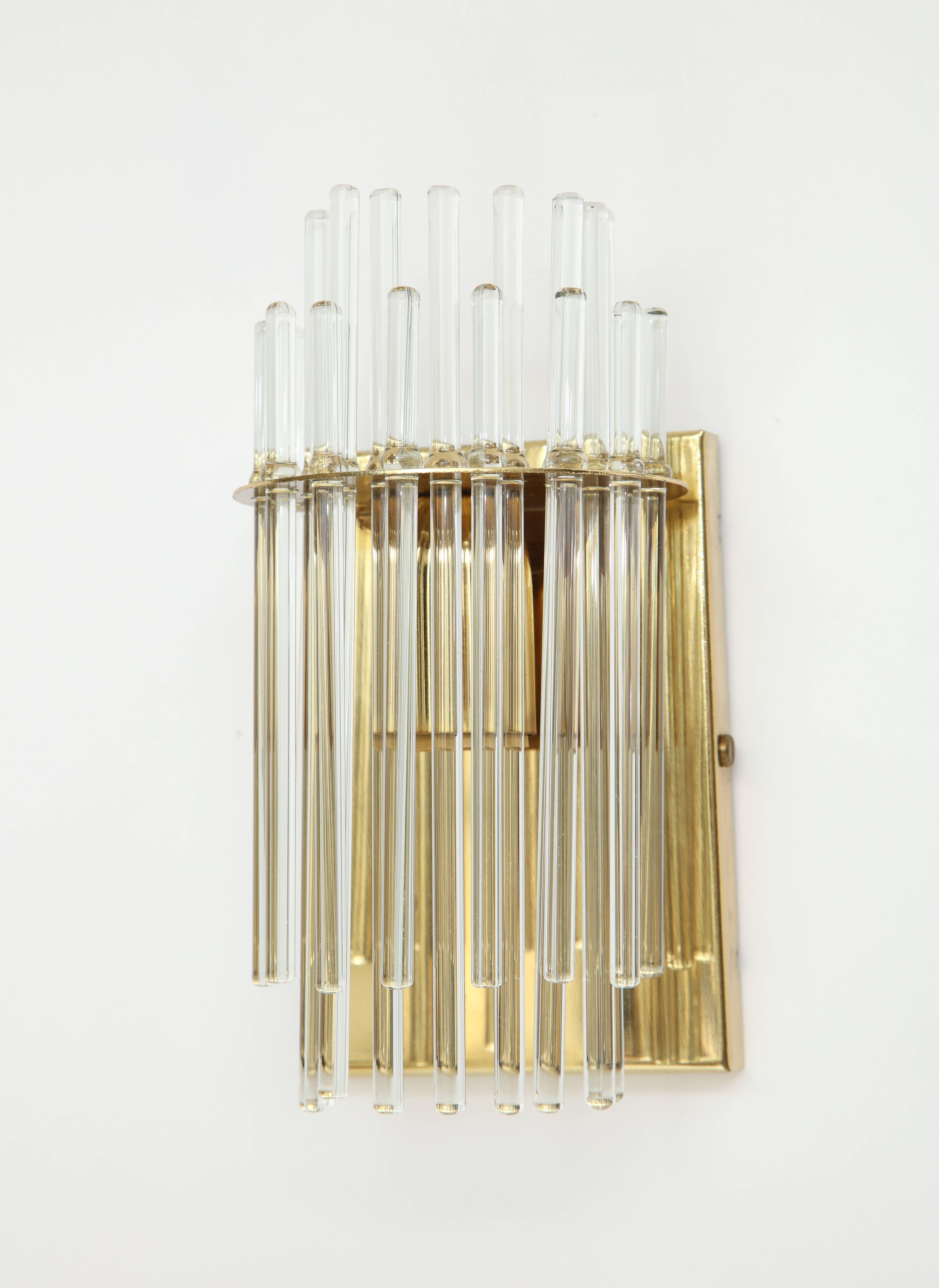 Sciolari glass rod brass Italian sconces, Mid-Century, 1960s

Beautiful glass rod sconces with brass backing. In lovely original condition.