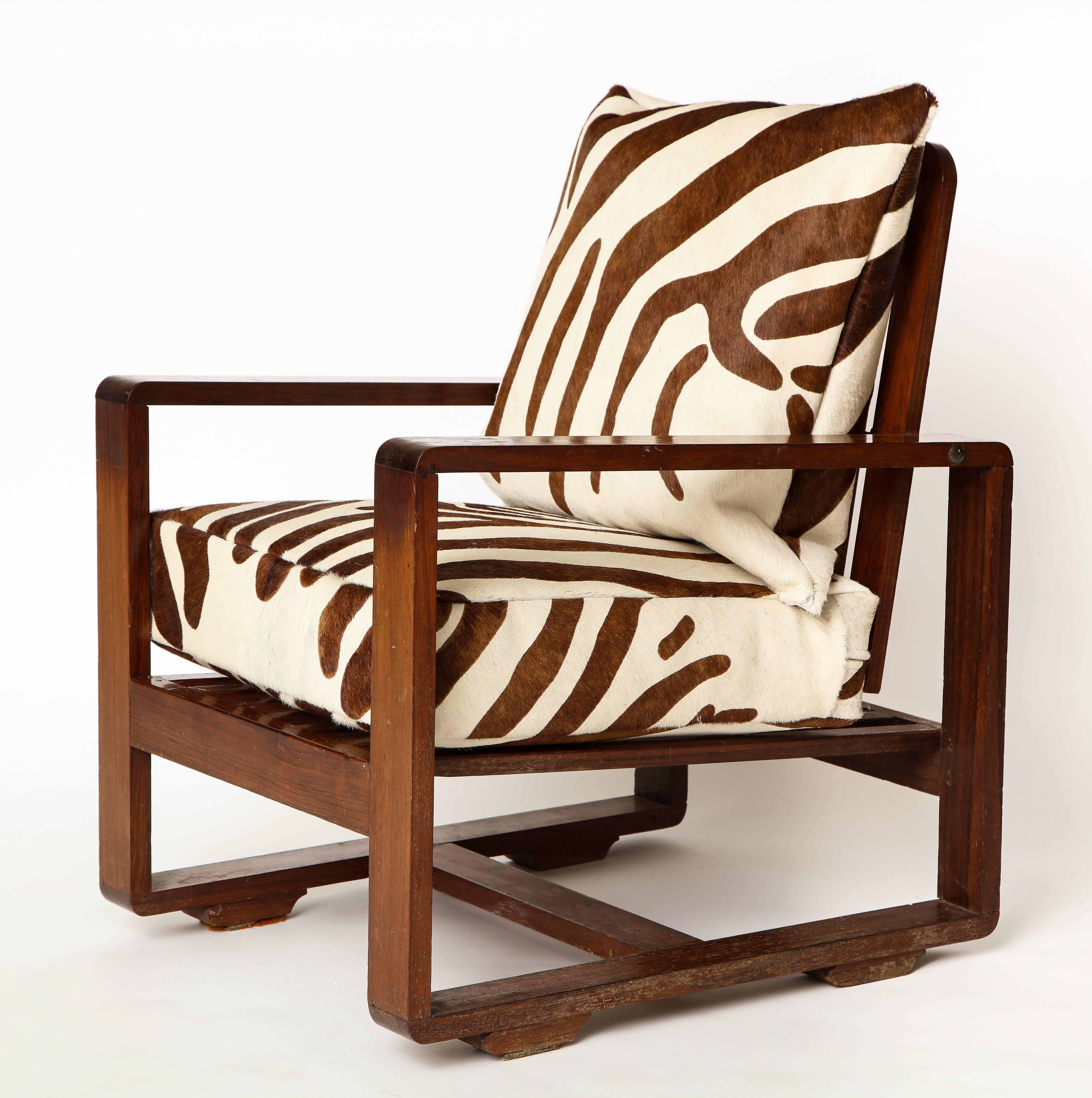 Sornay attributed deco Animal print rosewood lounge chairs, France, 1930s-1940s Mid-Century.

Incredible rosewood chairs with beautiful Patina throughout. Modernist square arms and tilting back. In lovely original condition.
Price is per chair