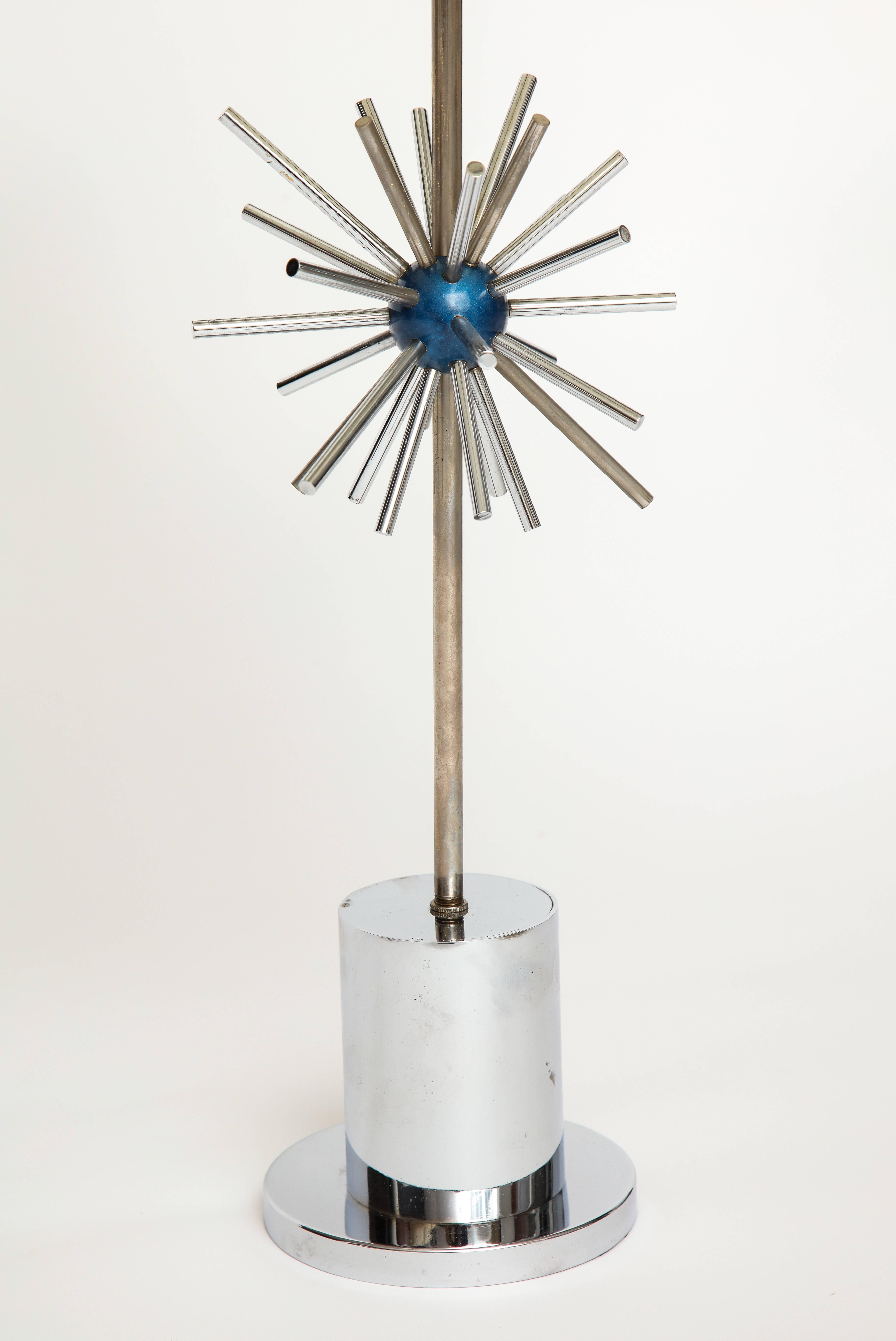 Chrome desk lamp with lacquered blue Sputnik design, French, 1970s.

Beautiful desk lamp in lovely condition. Original design.