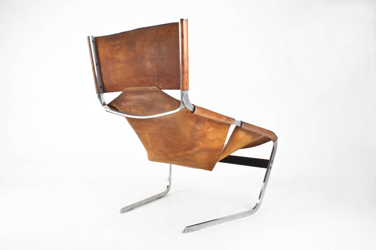 Original Pierre Paulin F444 lounge chair. A beautiful piece. The F444, later also known as F644, is designed by Pierre Paulin for Artifort in 1963. It’s one of his classic furniture designs. The original natural brown saddle leather has colored