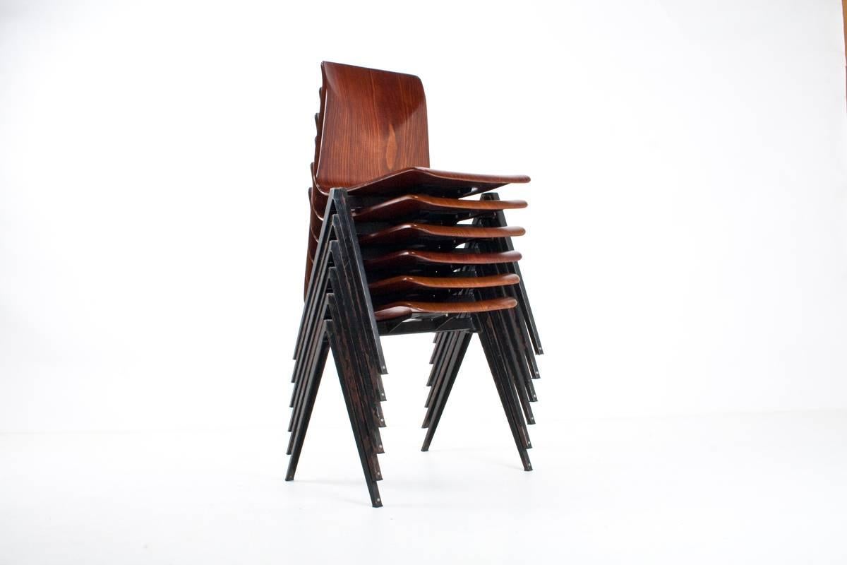 Industrial Dutch Galvanitas design, model S 22. School chairs with pyramid frame, designed in 1967 by Galvanitas inspired by the pyramid chairs of Wim Rietveld. 

The chairs are coproduced by Galvanitas and Pagholz (Germany). The frame is made of