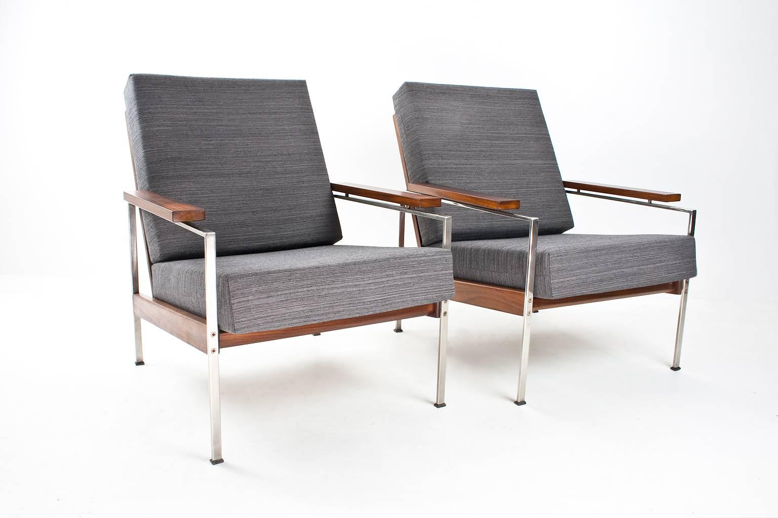 Original and unique Robert (Rob) Parry lounge chairs with loss new upholstered cushions in a metal and wooden frame. Designed for Dutch furniture company Gelderland (collection 1950s-1960s) in teakwood and chromed metal with new good quality grey