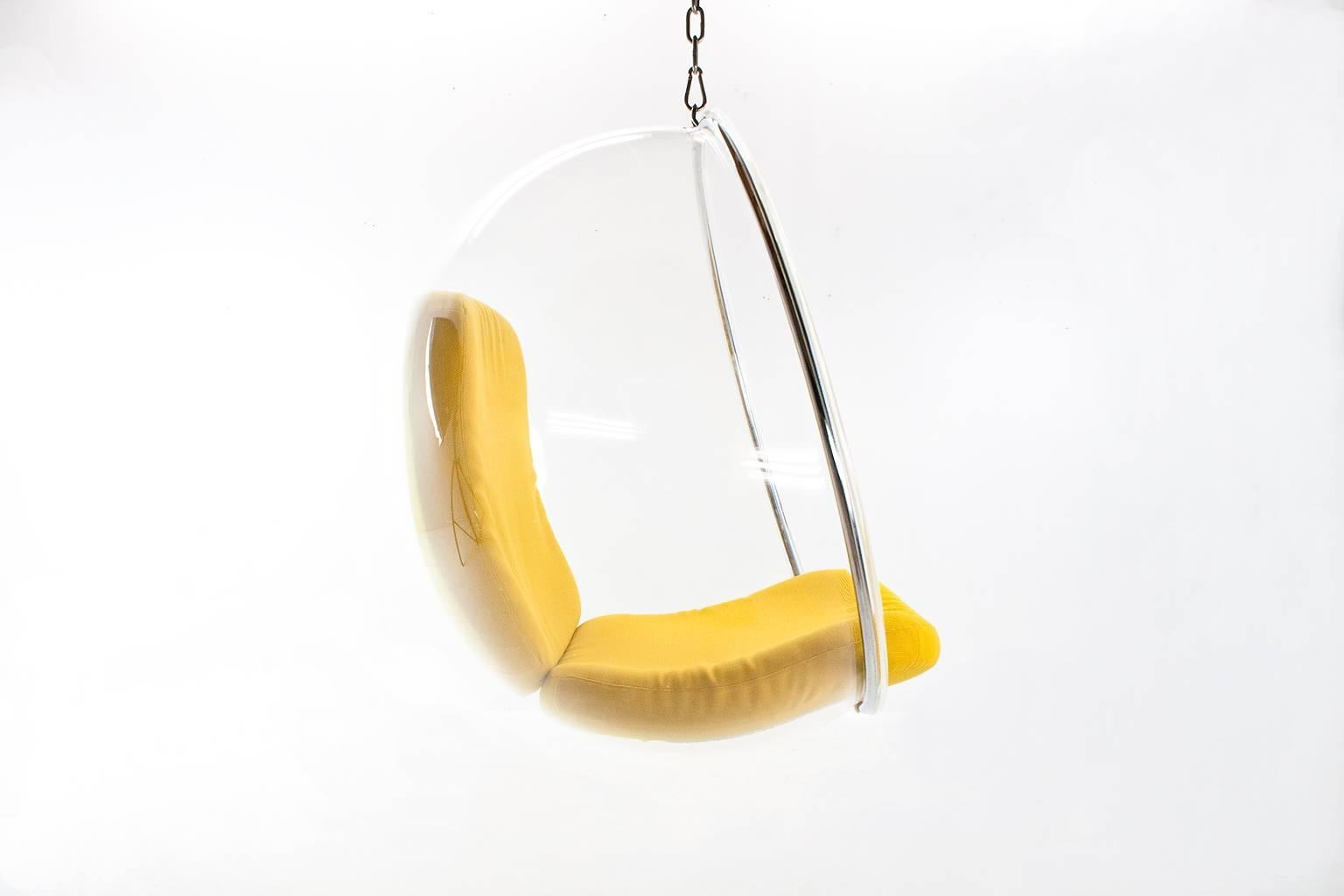 Iconic bubble chair designed by Eero Aarnio in 1968. This newer licensed production is produced by Aldelta. The sleek, instantly recognizable design is fabricated by heated acrylic which is then blown into a shape like a soap bubble. The edge is