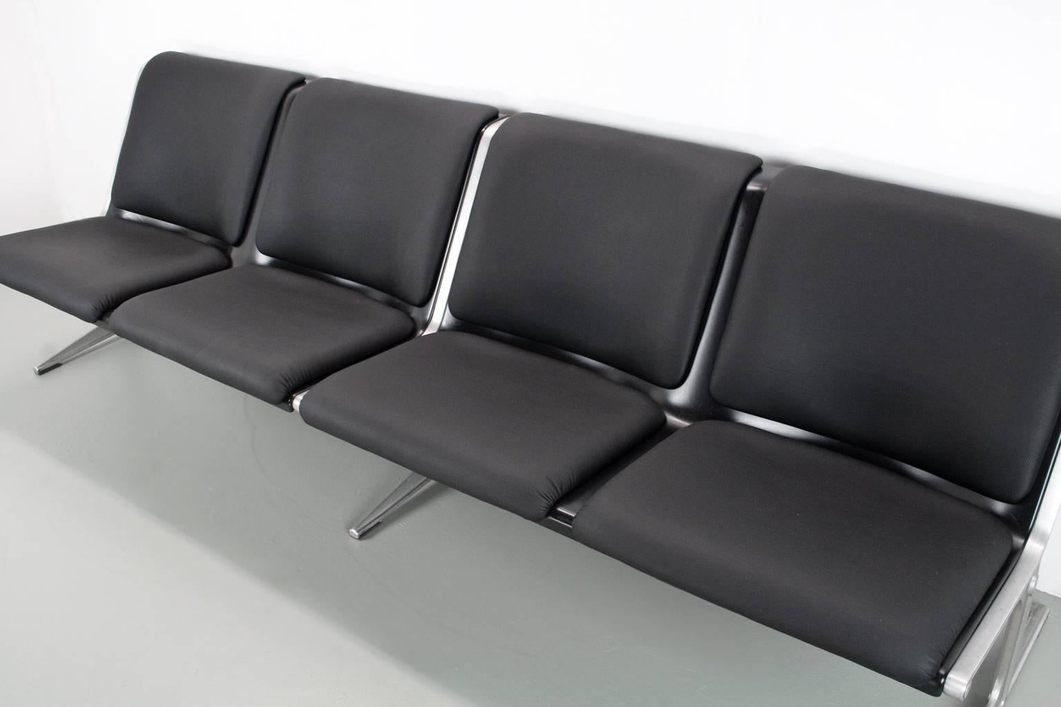 Re-upholstered four-seat bench by Dutch Industrial designer Friso Kramer for Wilkhahn Germany in 1967. Originally the 120/2 sofa was designed to be used in public and outdoor spaces: to form endless rows of seating’s. But with this upholstered